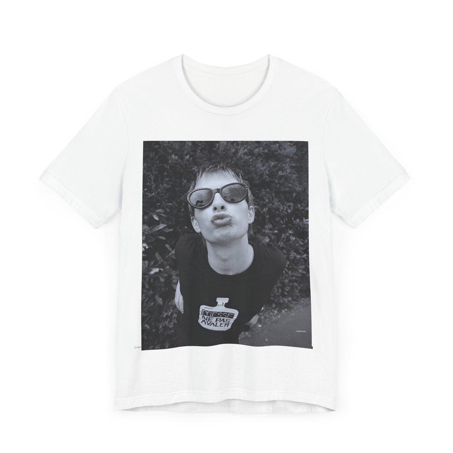 A black graphic t-shirt featuring a retro 90s graphic of Thom Yorke from Radiohead.