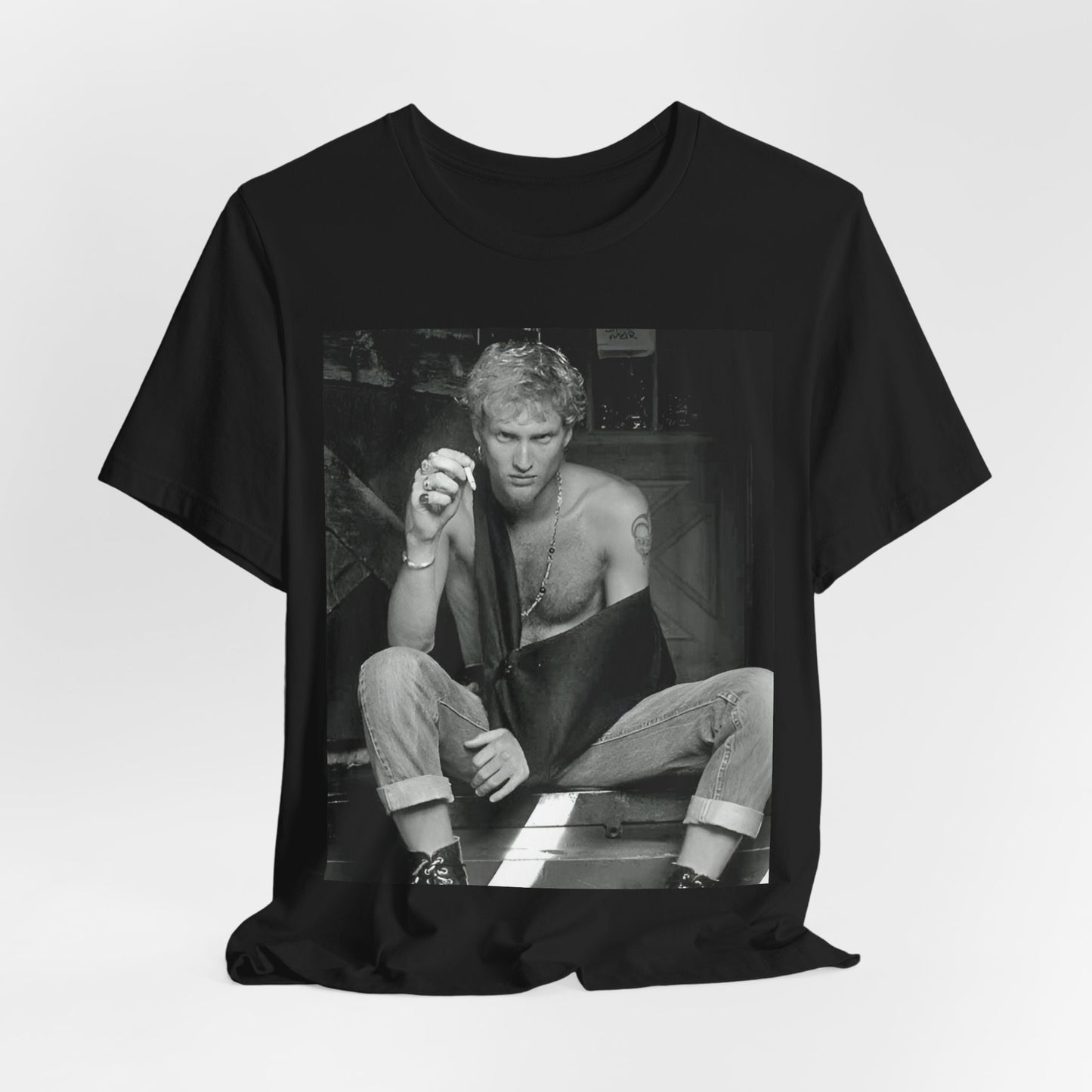 A black graphic t-shirt featuring a 90s-style graphic of Layne Staley from Alice In Chains, possibly a portrait or performance image.