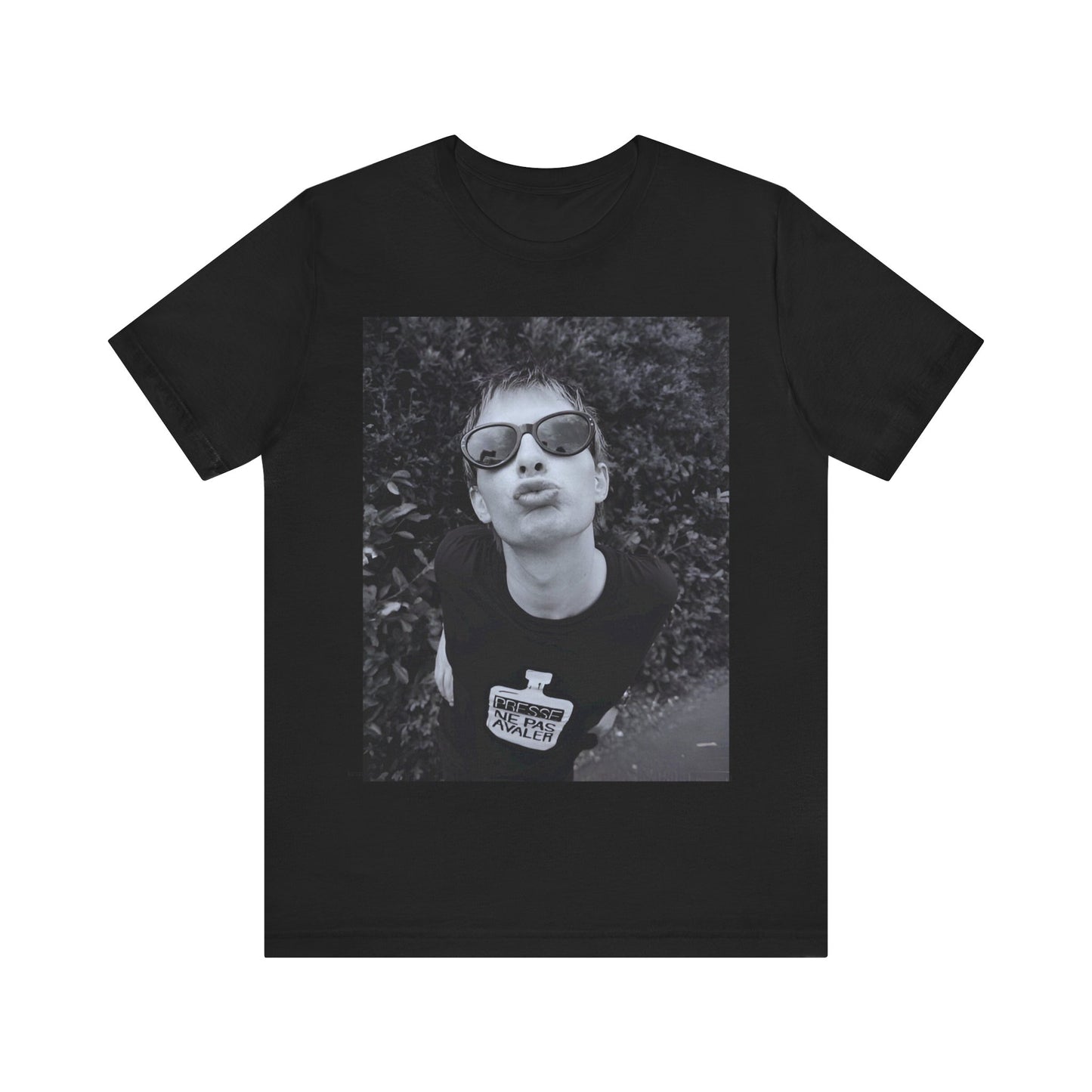 A black graphic t-shirt featuring a retro 90s graphic of Thom Yorke from Radiohead.