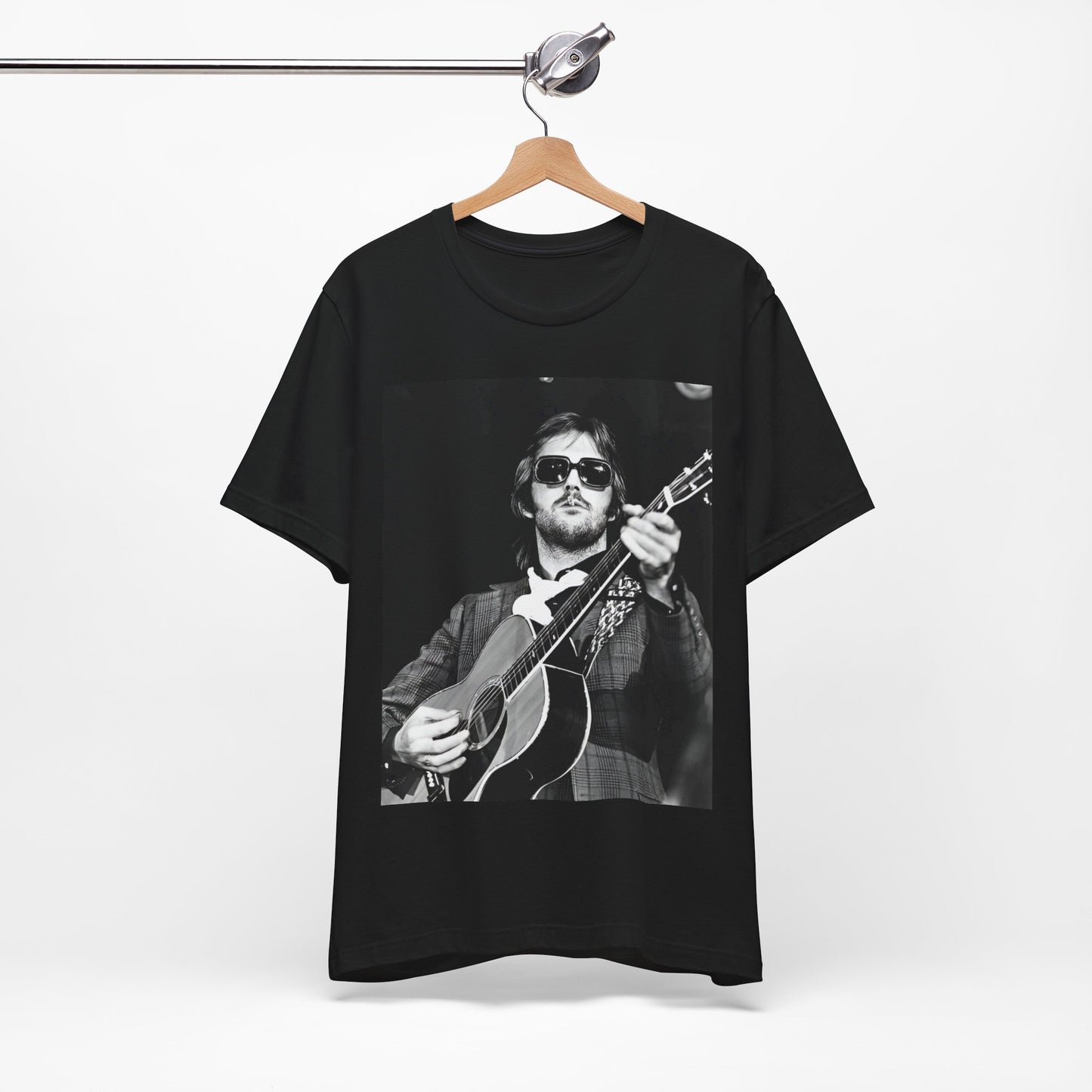 A black graphic t-shirt featuring a graphic of Eric Clapton with a chill blues rock vibe.