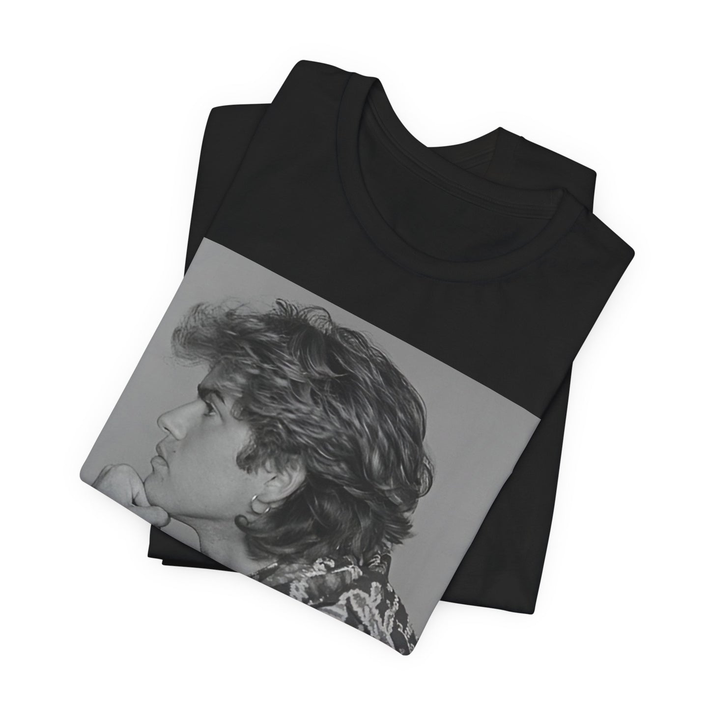 A black graphic t-shirt featuring a graphic of George Michael from his 80s Wham! era.