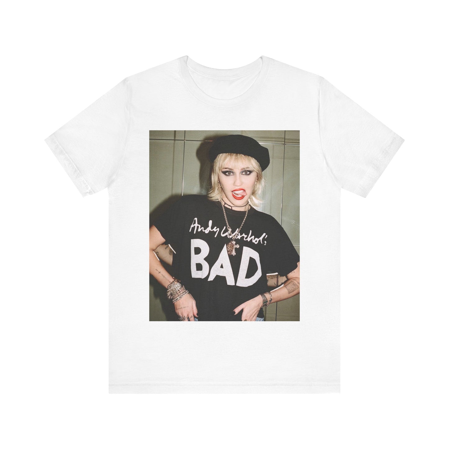 A black graphic t-shirt featuring a graphic related to Miley Cyrus' 'Bad Karma' era.
