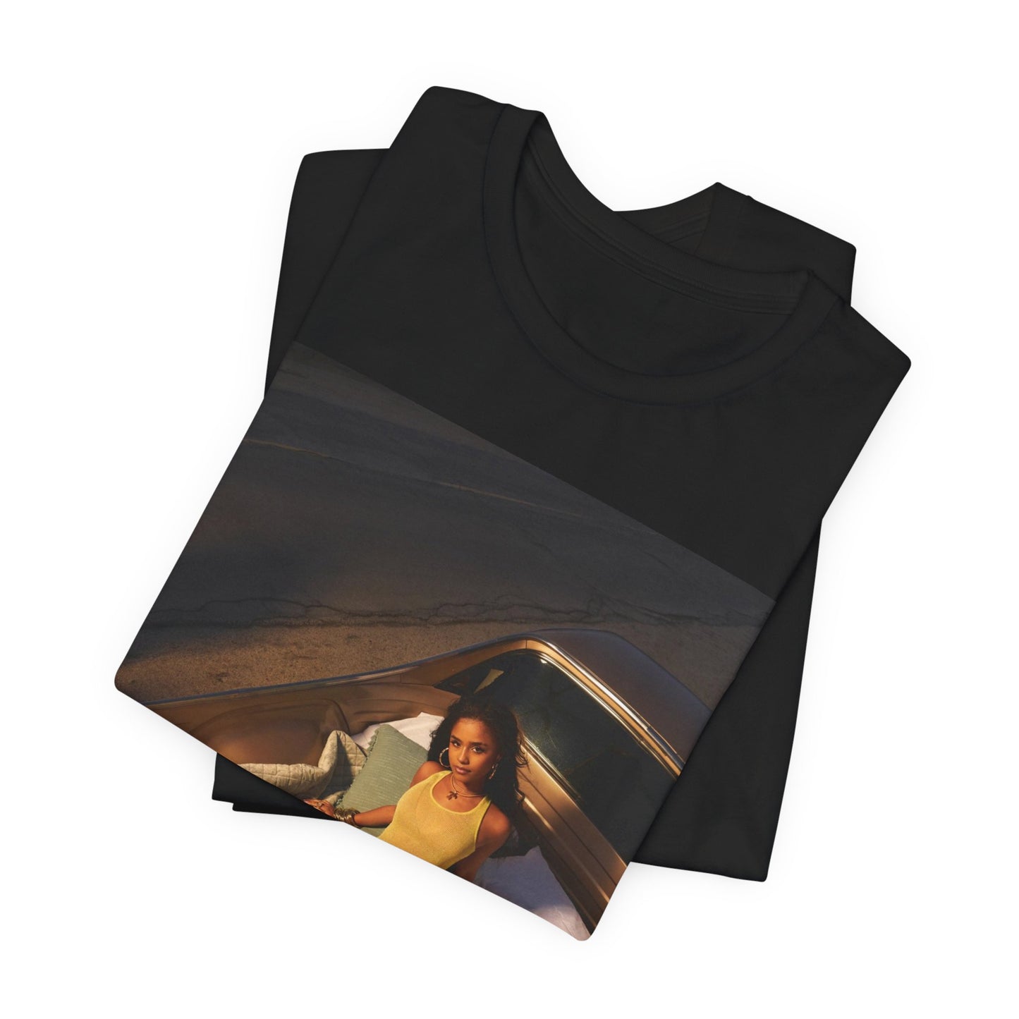 A black graphic t-shirt featuring a graphic of Tyla as an African fashion icon.