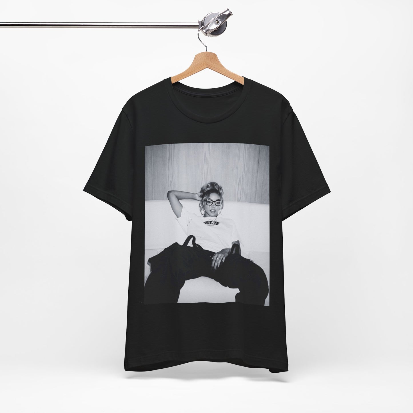 A black graphic t-shirt featuring a black and white portrait photo of Tinashe.