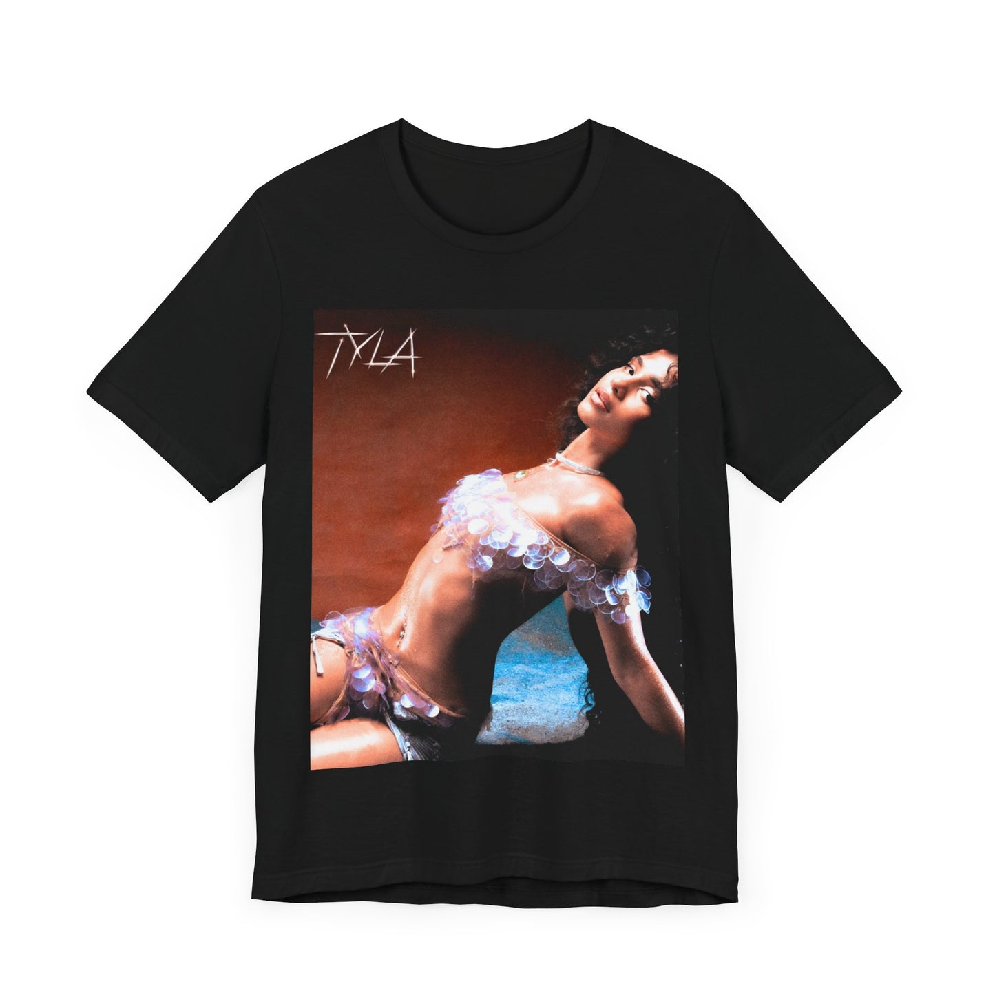 A black graphic t-shirt featuring a cultural fusion vibes graphic of Tyla.