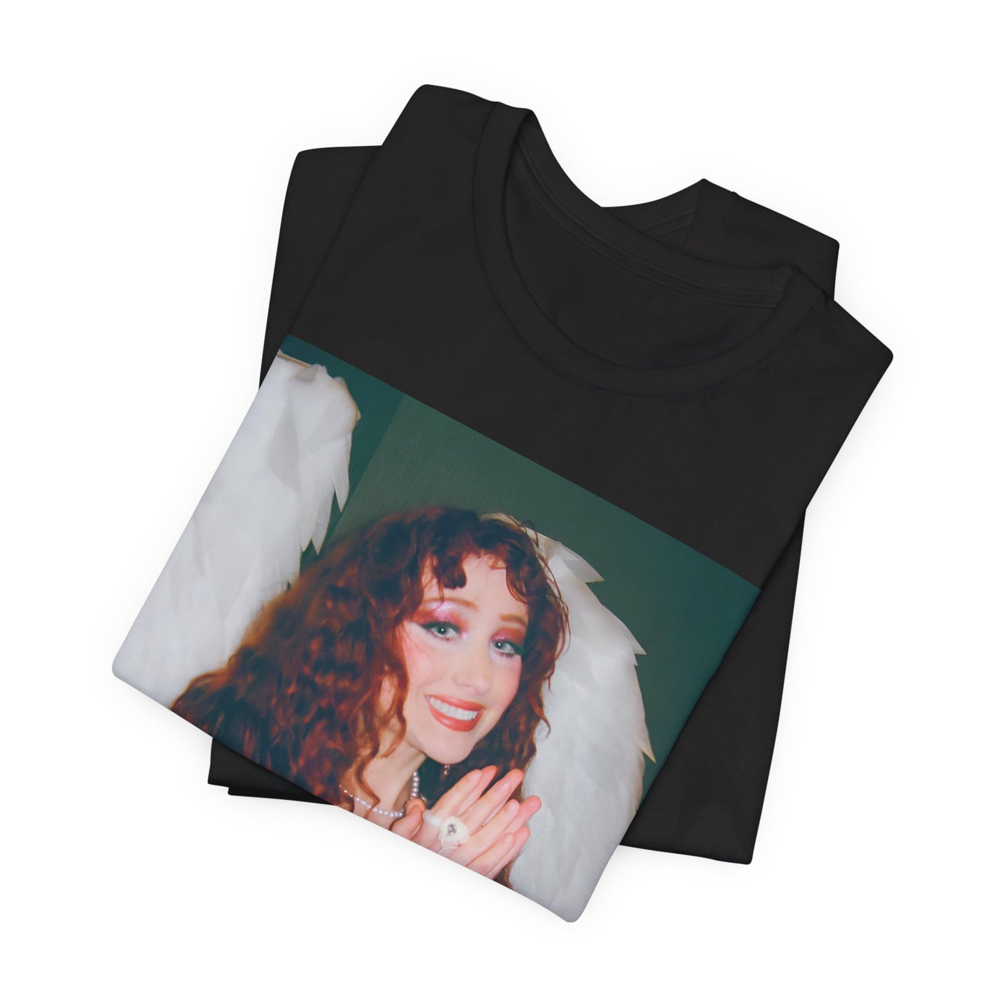 A black graphic t-shirt featuring a graphic of Chappell Roan, possibly with DIY or independent pop elements.