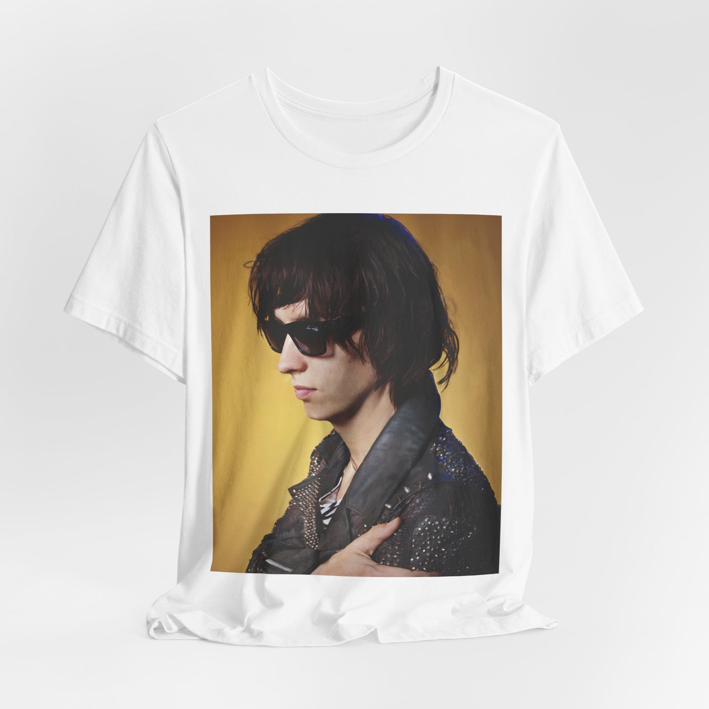 A black graphic t-shirt featuring a retro graphic related to The Strokes' 'Is This It' album era.