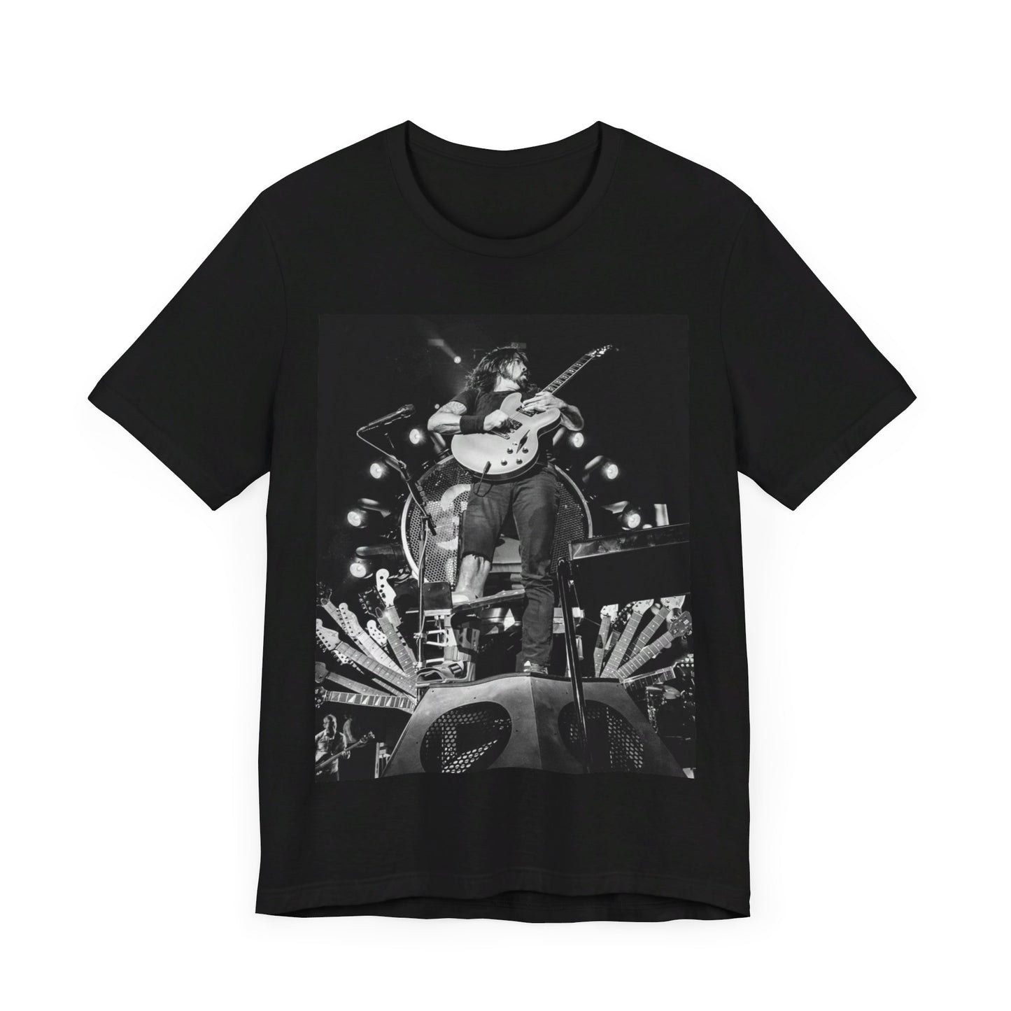 A black graphic t-shirt featuring a vintage photo of Foo Fighters performing live.