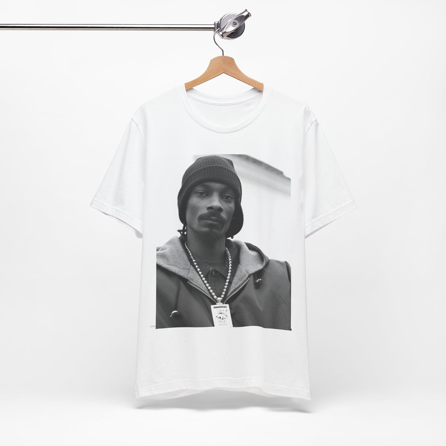 A black graphic t-shirt featuring a black and white, monochrome graphic of Snoop Dogg with an OG cool vibe.