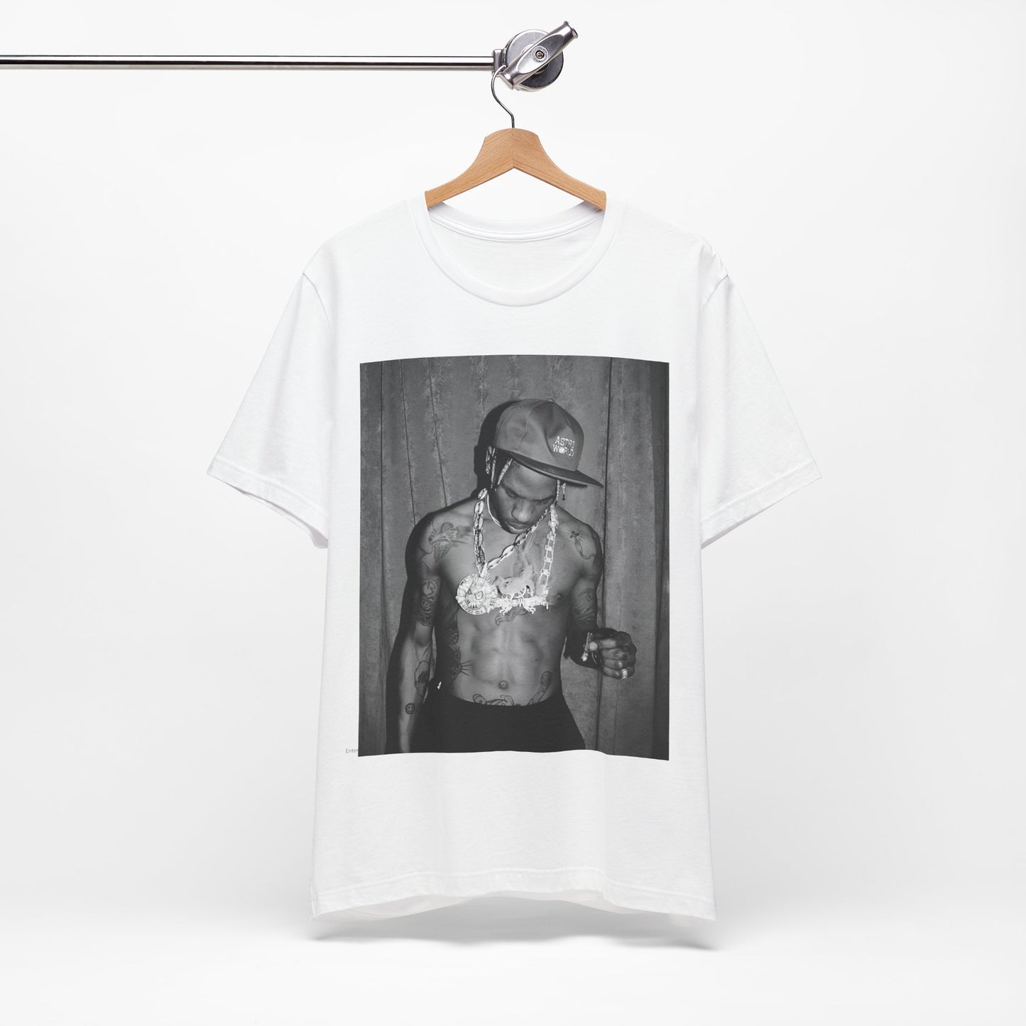 A black graphic t-shirt featuring a graphic of Travis Scott as the Houston rap king.