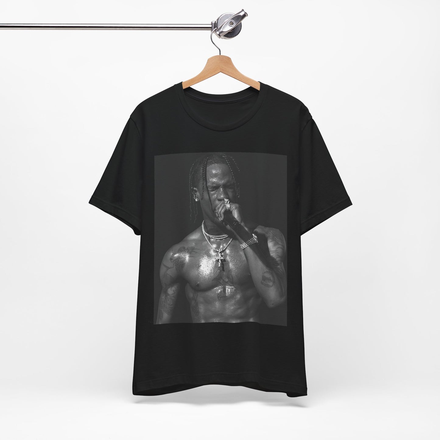 A black graphic t-shirt featuring an underground hip hop graphic of Travis Scott.