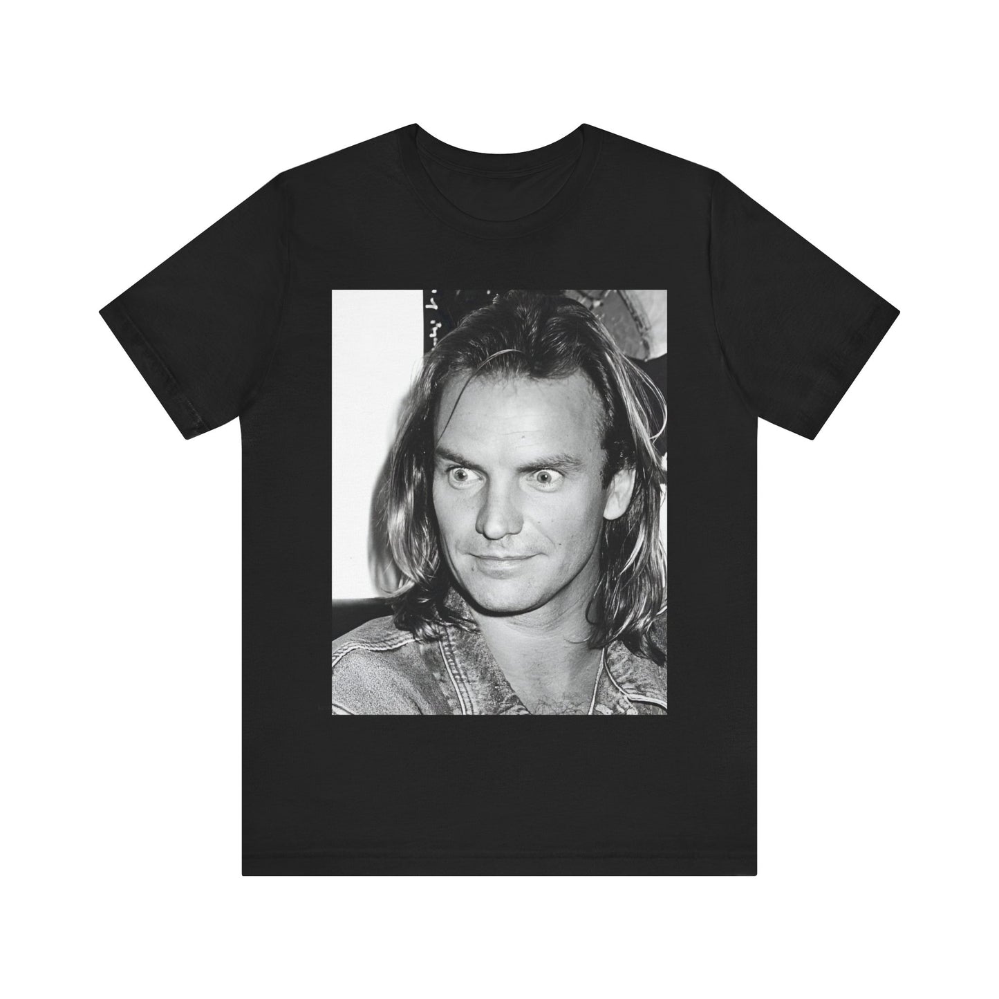 A black graphic t-shirt featuring a retro graphic related to Sting's 'Synchronicity' album era.
