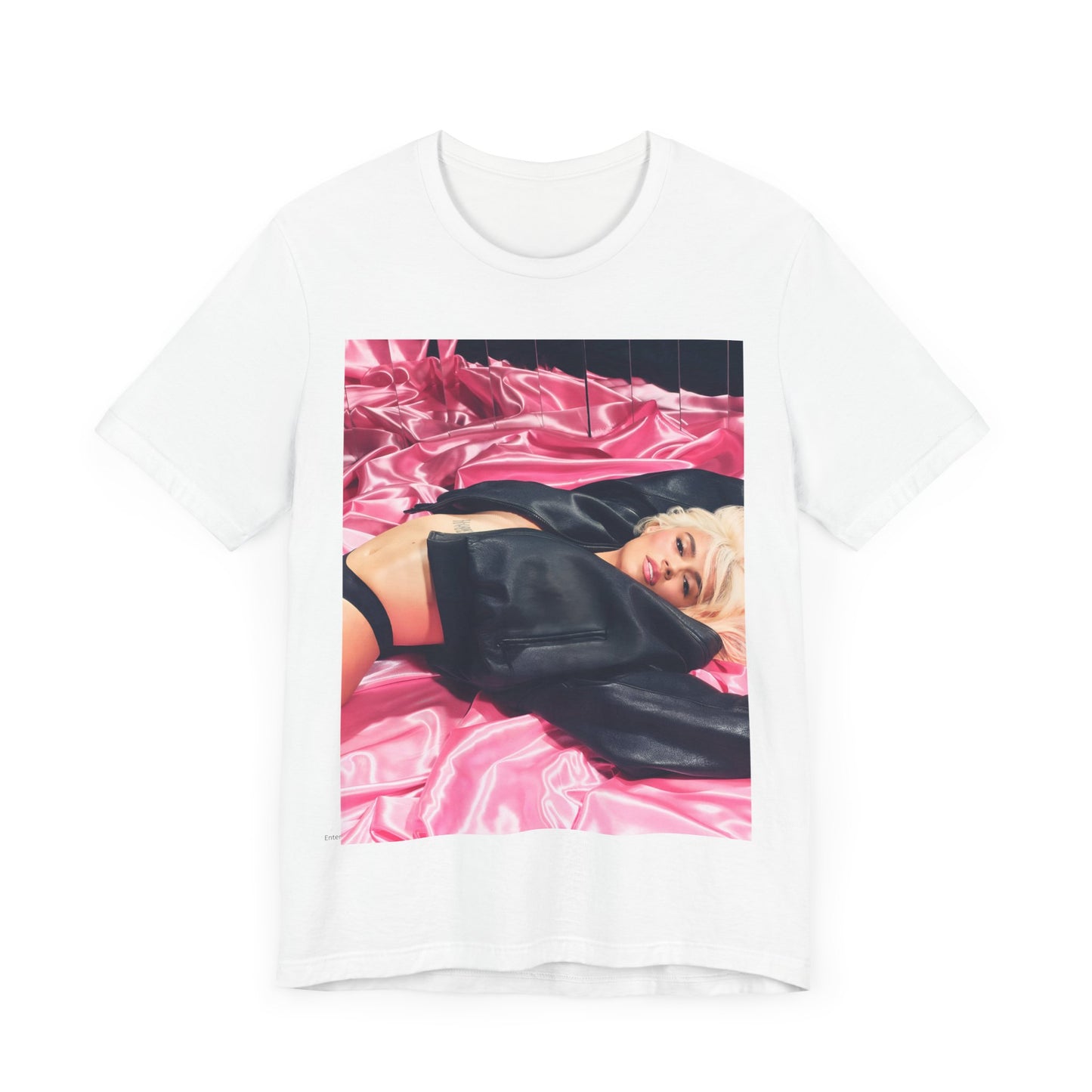 A black graphic t-shirt featuring a vintage aesthetic graphic related to Karol G's 'Tusa' era.
