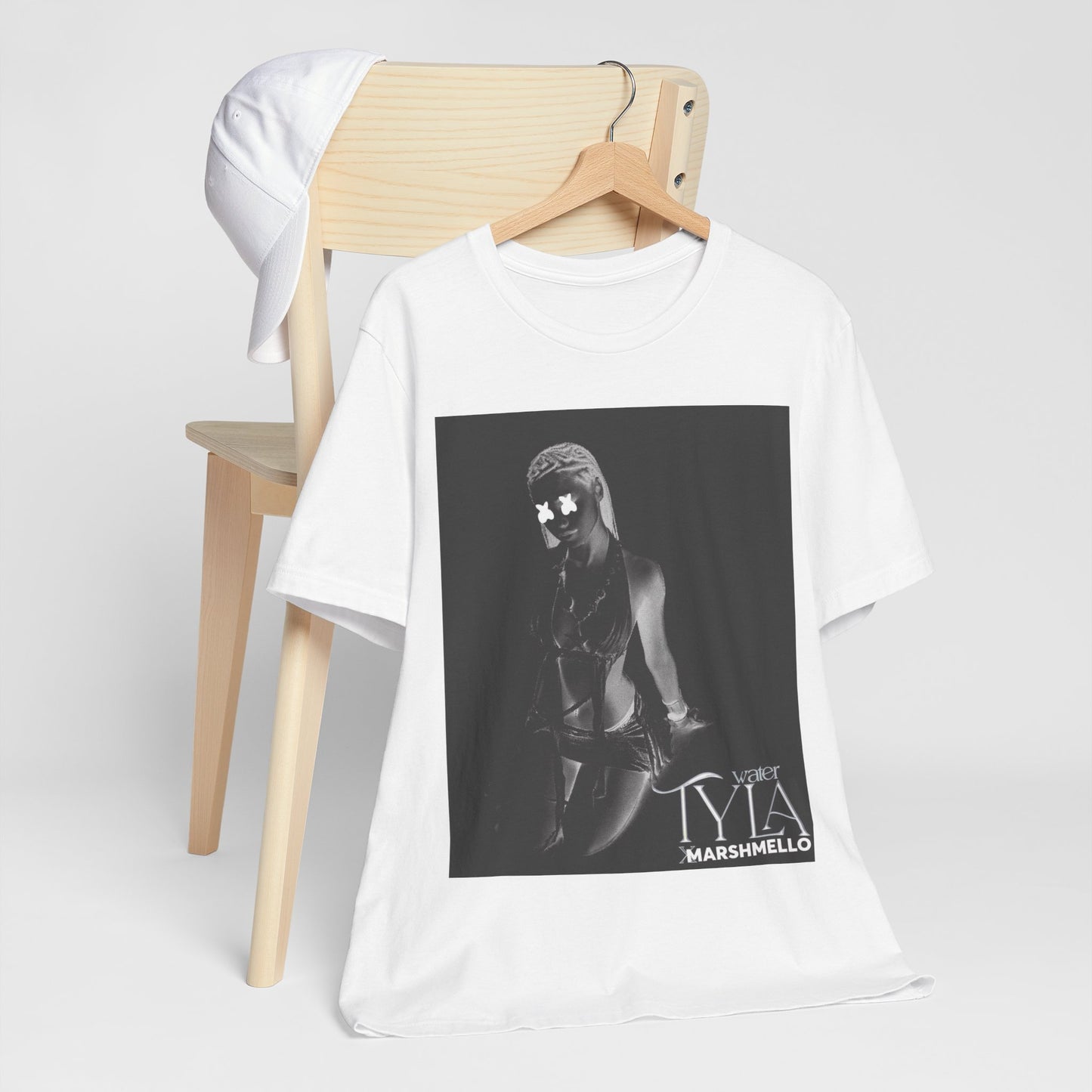 A black graphic t-shirt featuring a vintage amapiano icon graphic of Tyla.