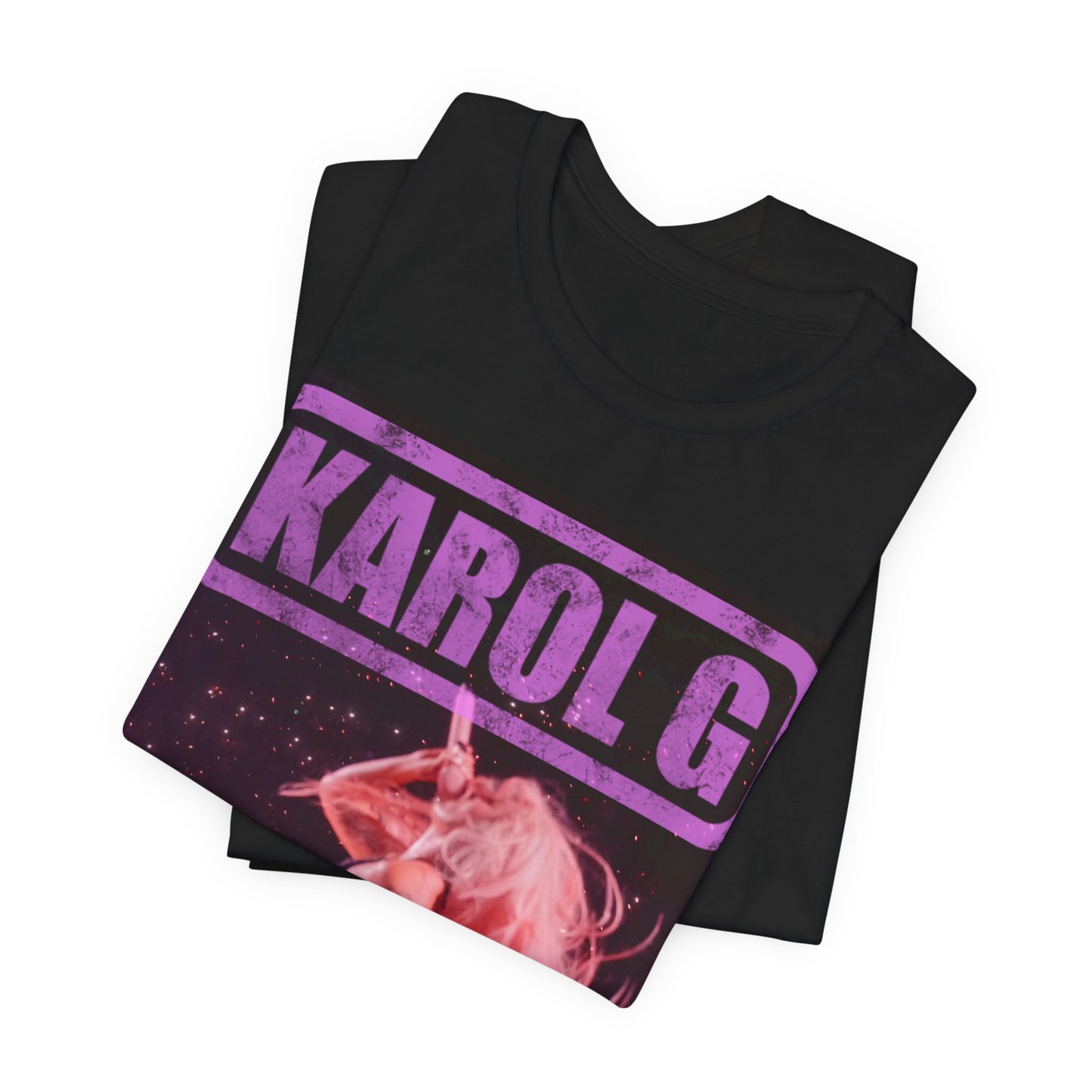 A black graphic t-shirt featuring a glamorous graphic or photo of Karol G performing live.