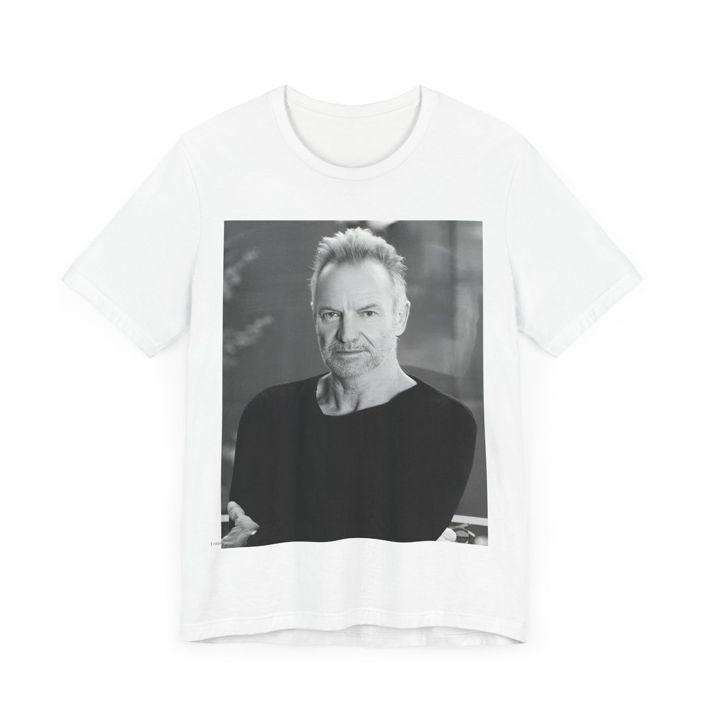 A black graphic t-shirt featuring a vintage graphic related to Sting's 'Desert Rose' song or era.