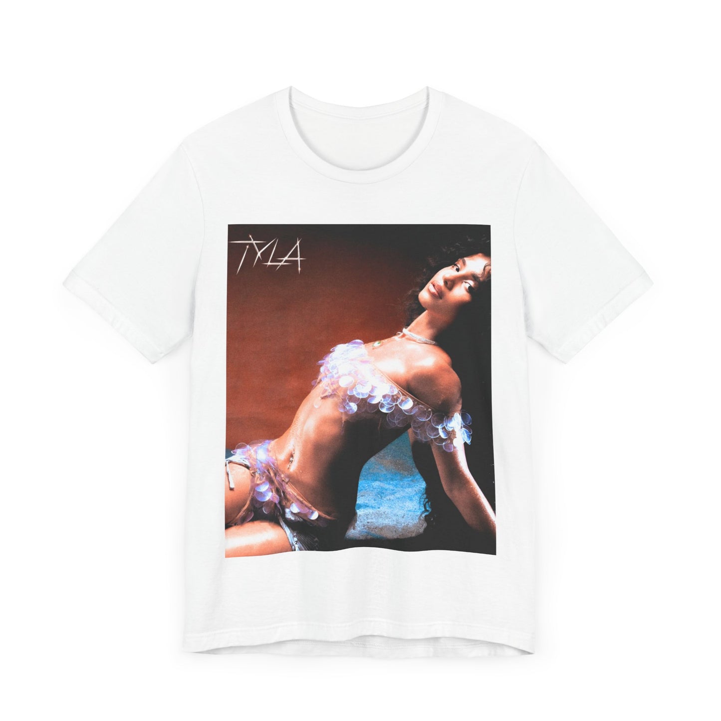A black graphic t-shirt featuring a cultural fusion vibes graphic of Tyla.