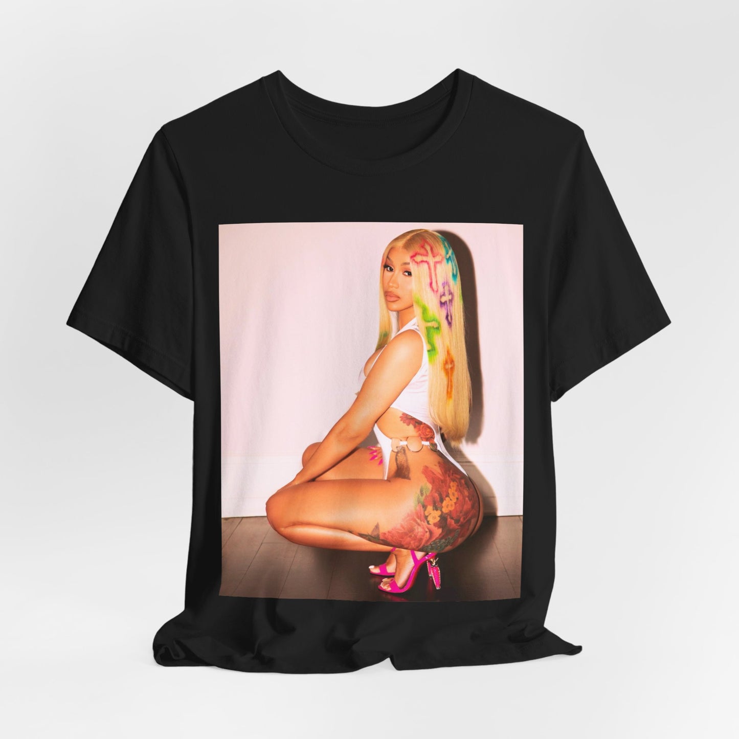 A black graphic t-shirt featuring a graphic of Cardi B in a bold, fashion-forward pose, emphasizing her 'fashion killa' style.