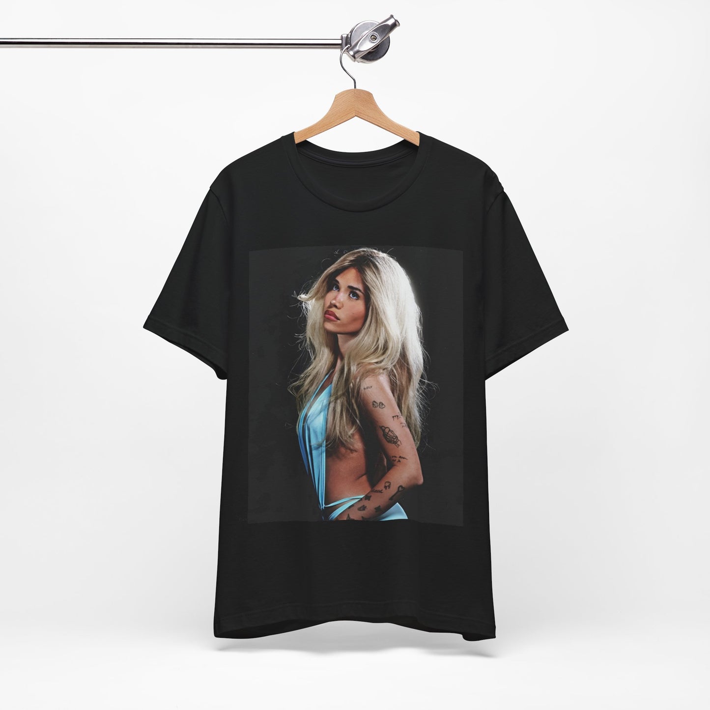 A black graphic t-shirt featuring a graphic related to Nessa Barrett's 'Pain' song or era.
