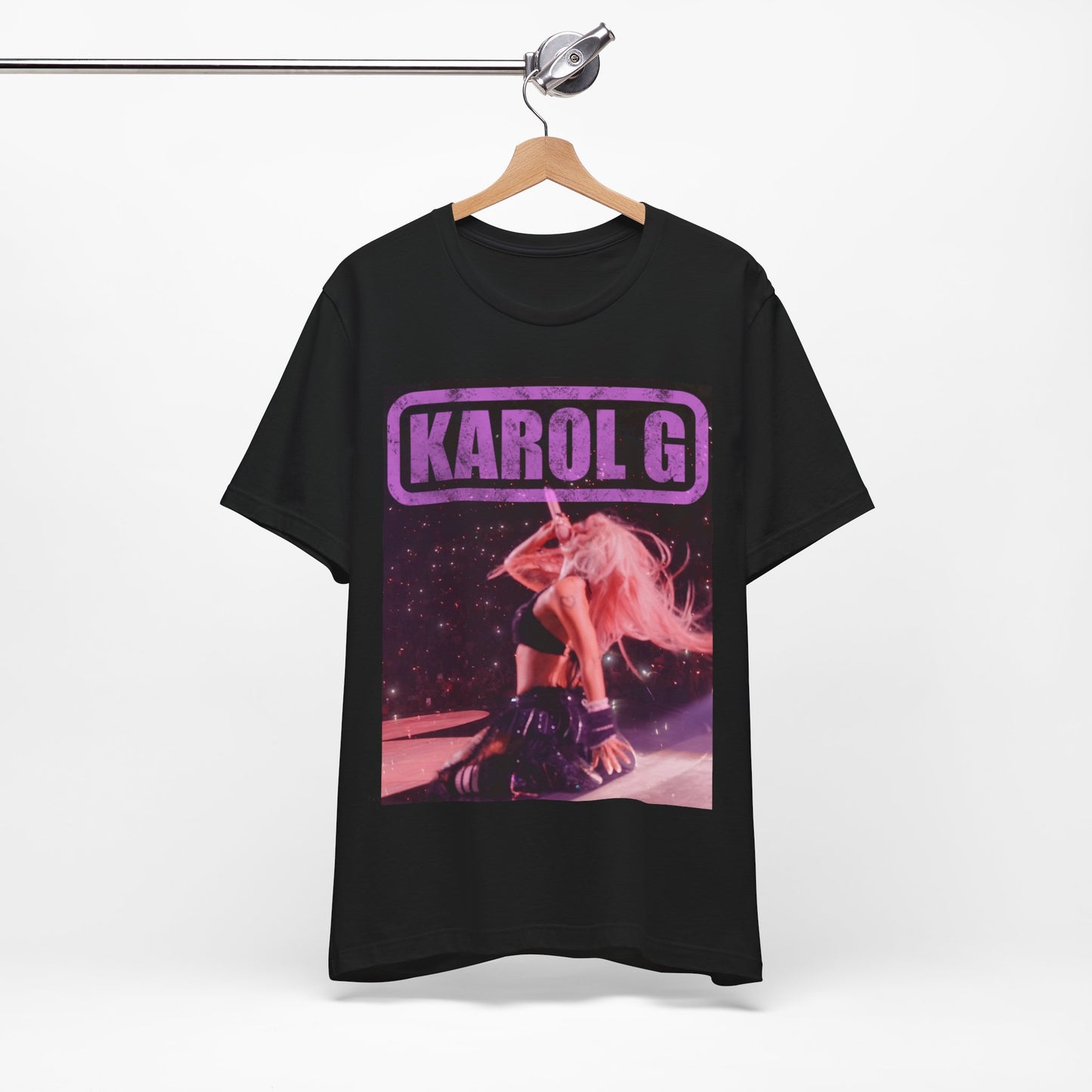 A black graphic t-shirt featuring a glamorous graphic or photo of Karol G performing live.
