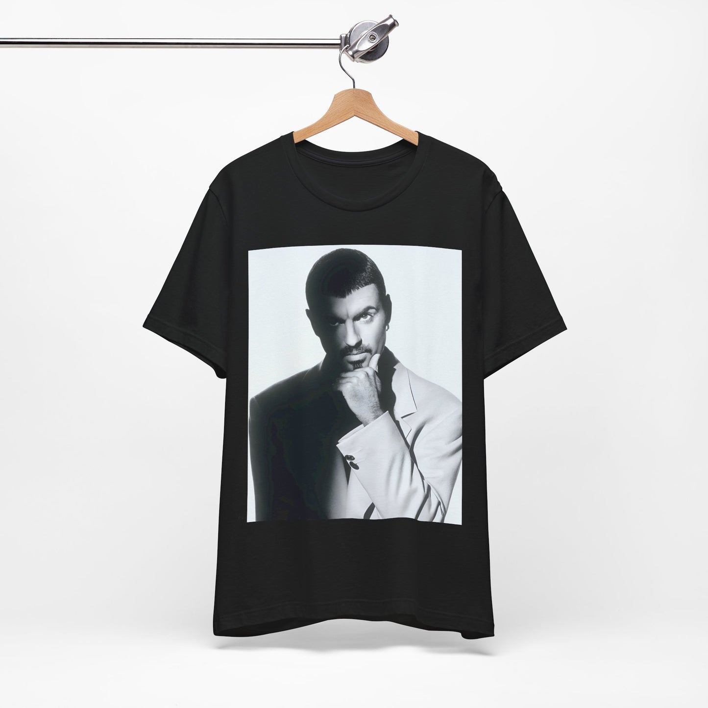 A black graphic t-shirt featuring a 90s aesthetic graphic of George Michael.