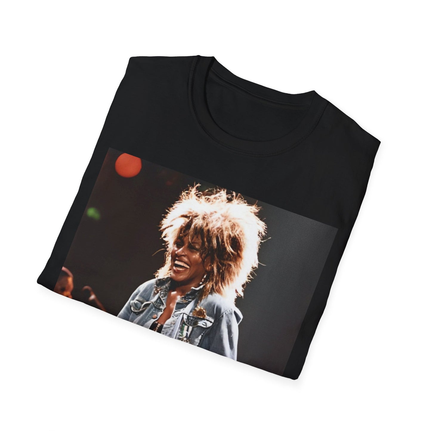 A black graphic t-shirt featuring a 90s graphic of Tina Turner emphasizing her on-stage presence.
