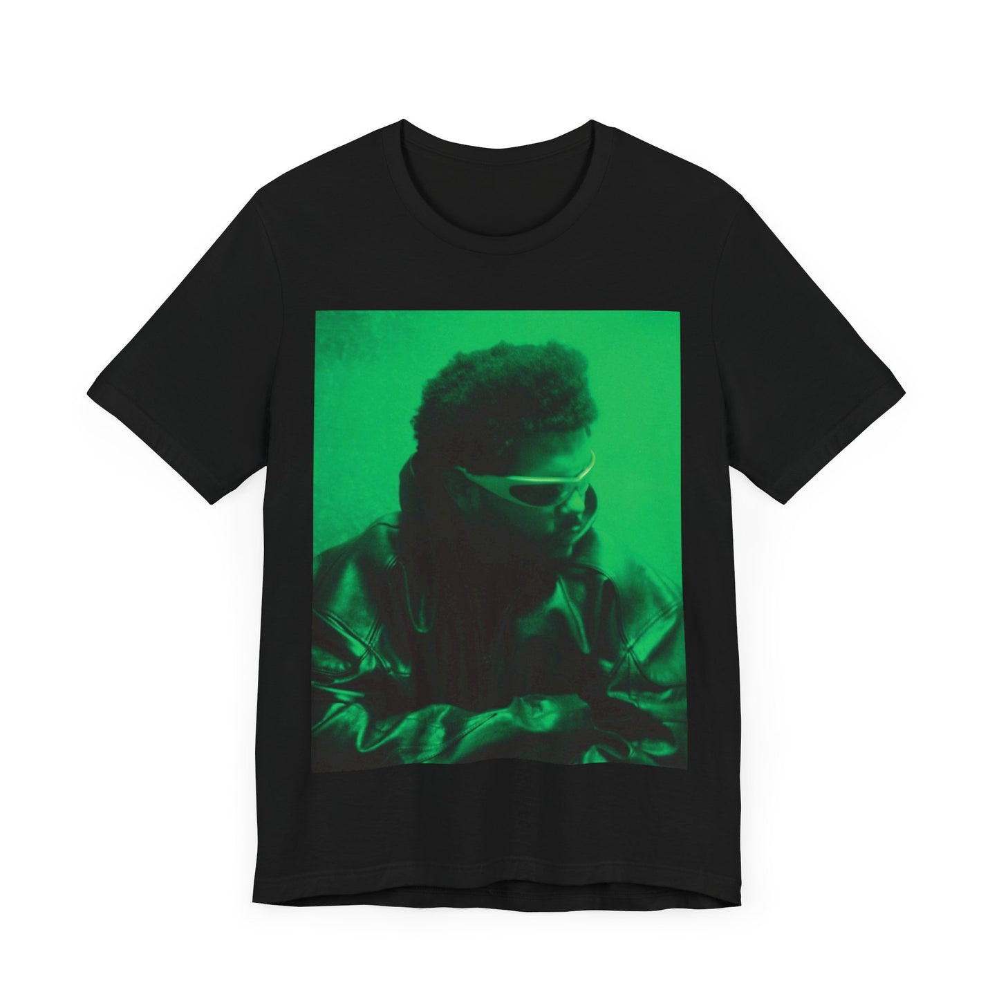 A black graphic t-shirt featuring a vintage graphic related to The Weeknd's 'Kiss Land' era.
