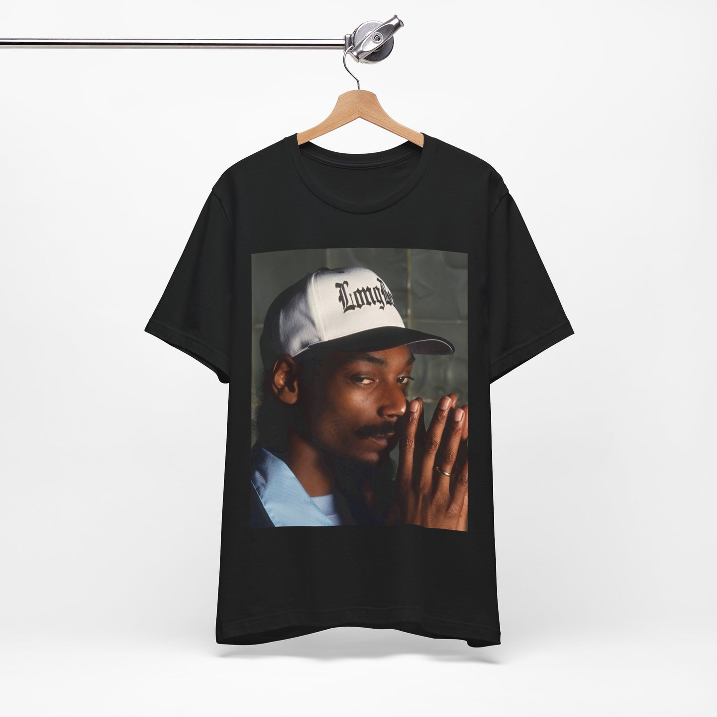 A black graphic t-shirt featuring a graphic of Snoop Dogg with a boxy 'Doggfather' vibe.