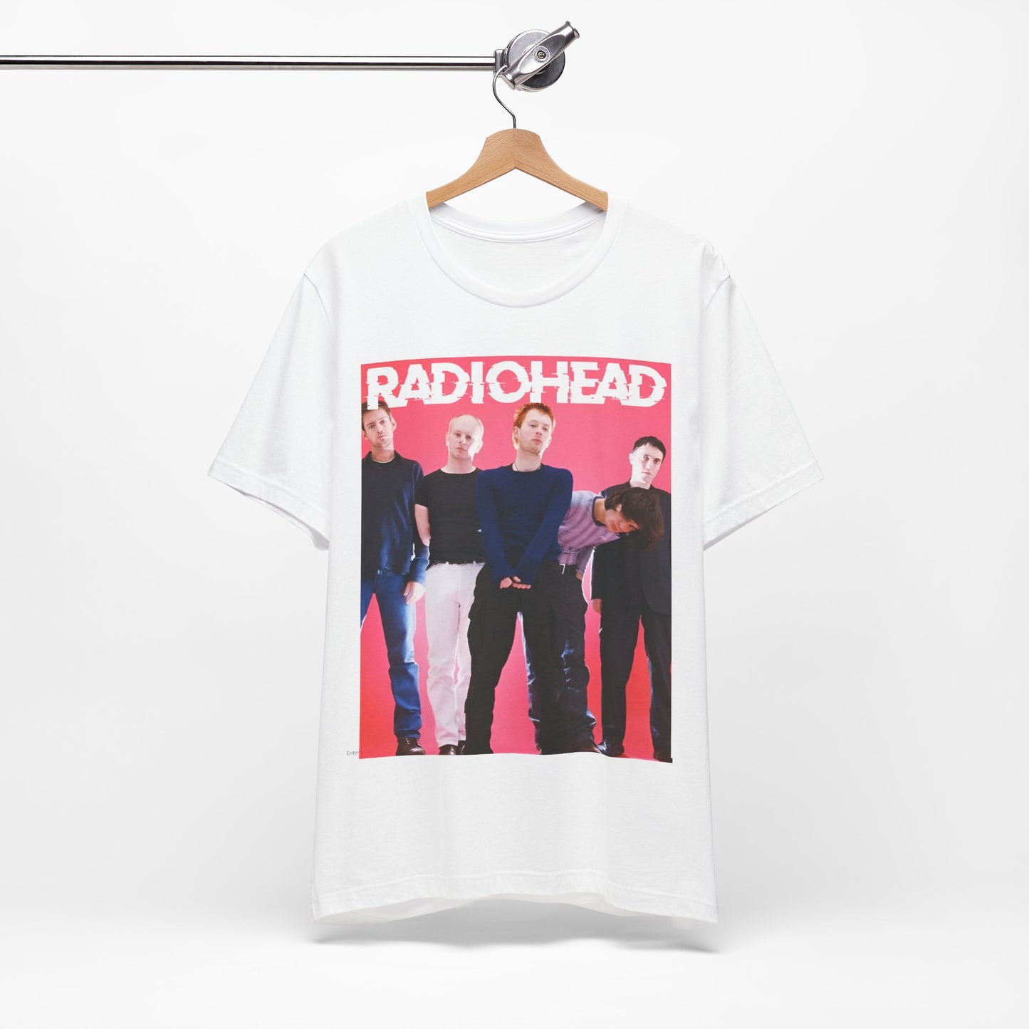 A black graphic t-shirt featuring a 90s alternative aesthetic graphic of Radiohead.