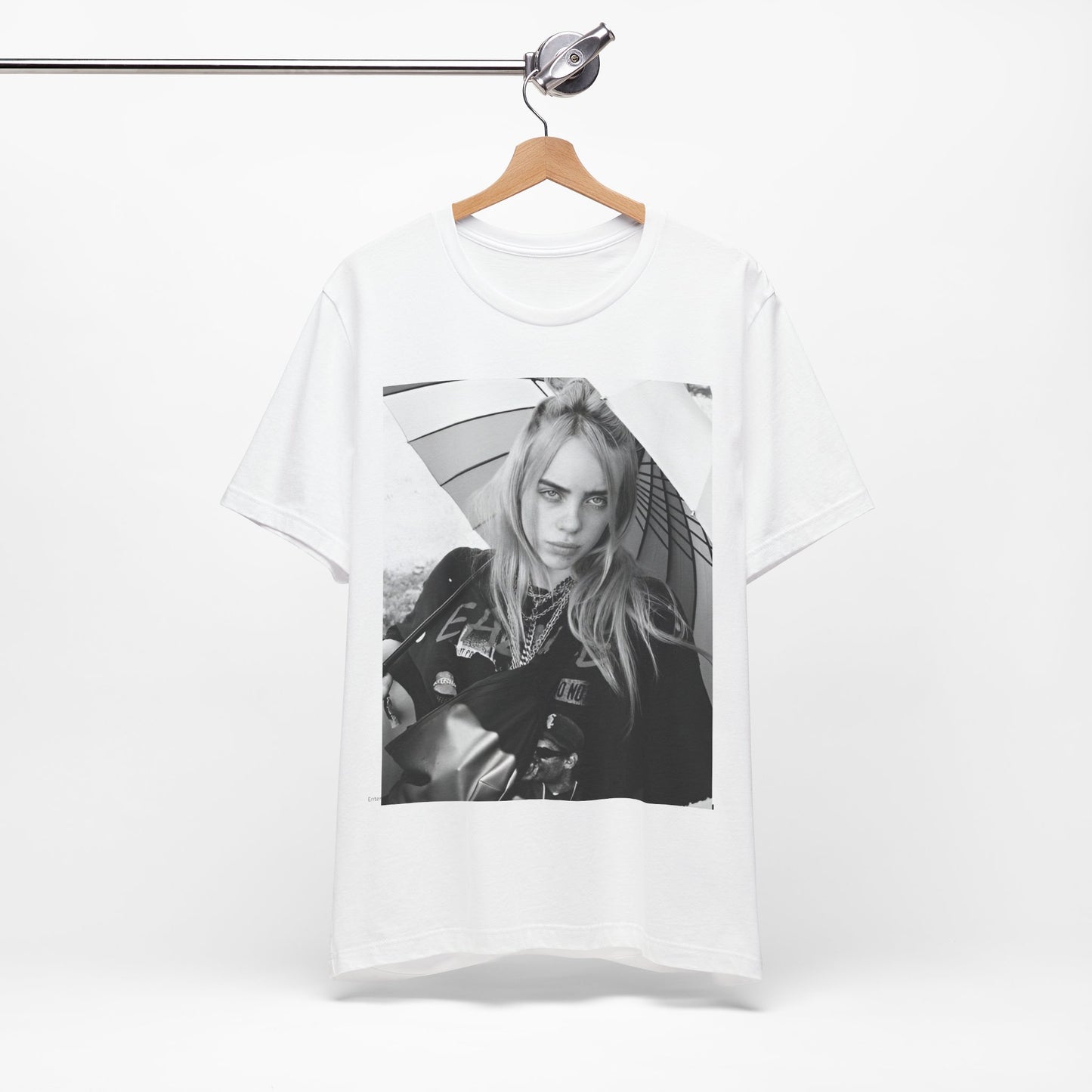 A graphic t-shirt inspired by the colorful and iconic music video for "Bad Guy" by Billie Eilish.