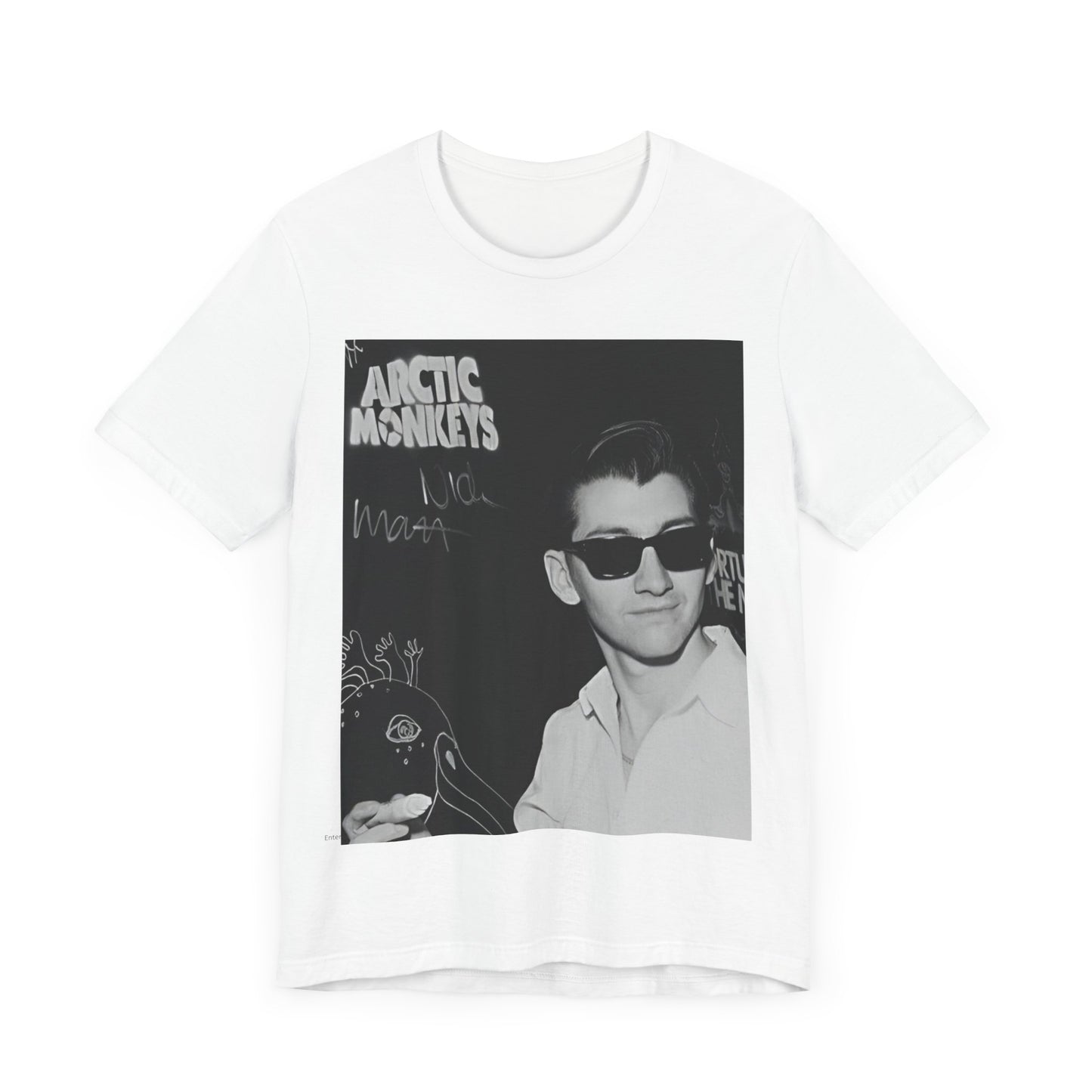 A black graphic t-shirt featuring a black and white portrait photo of Alex Turner from Arctic Monkeys, showing his signature look.