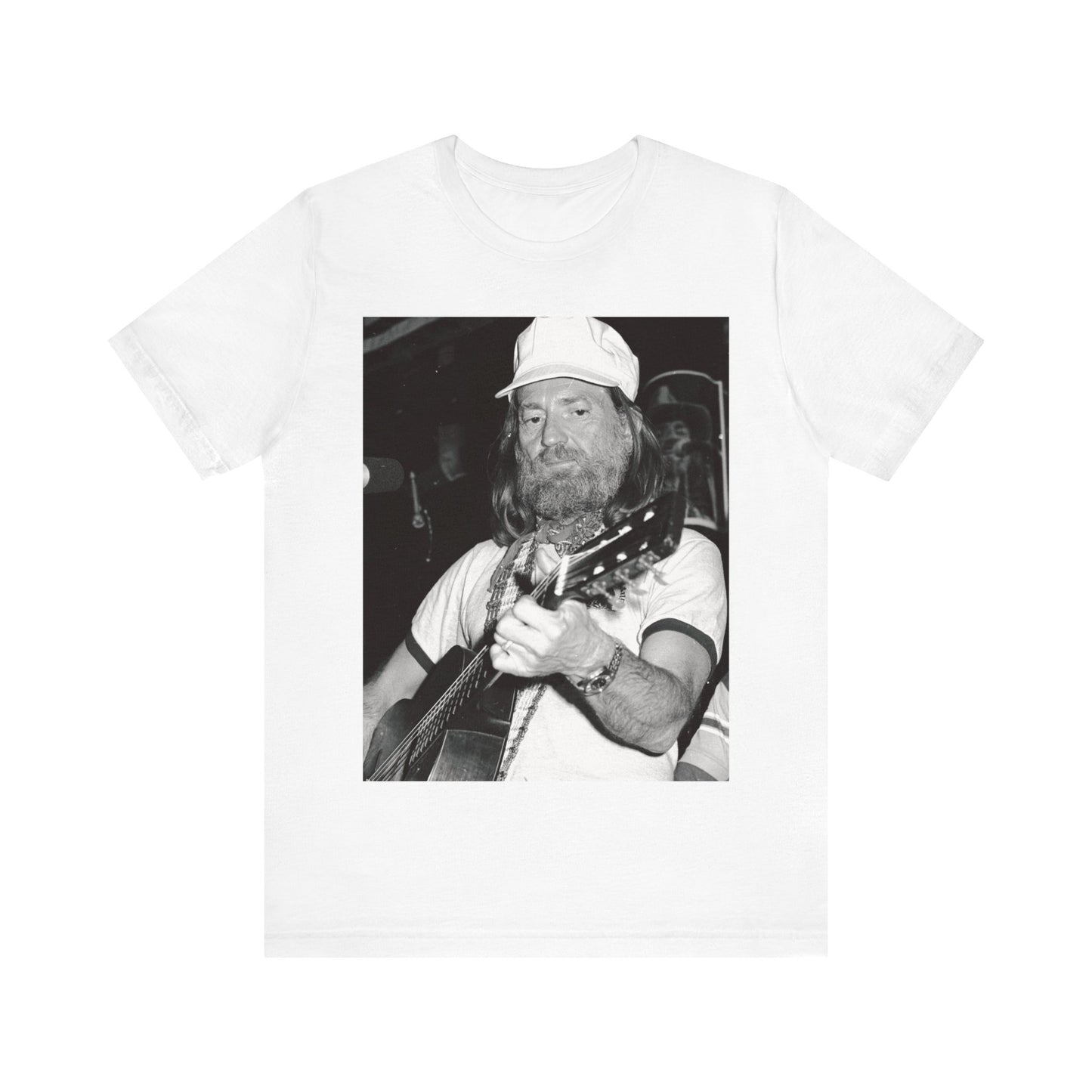 A black graphic t-shirt featuring a 70s cool free spirit graphic of Willie Nelson.