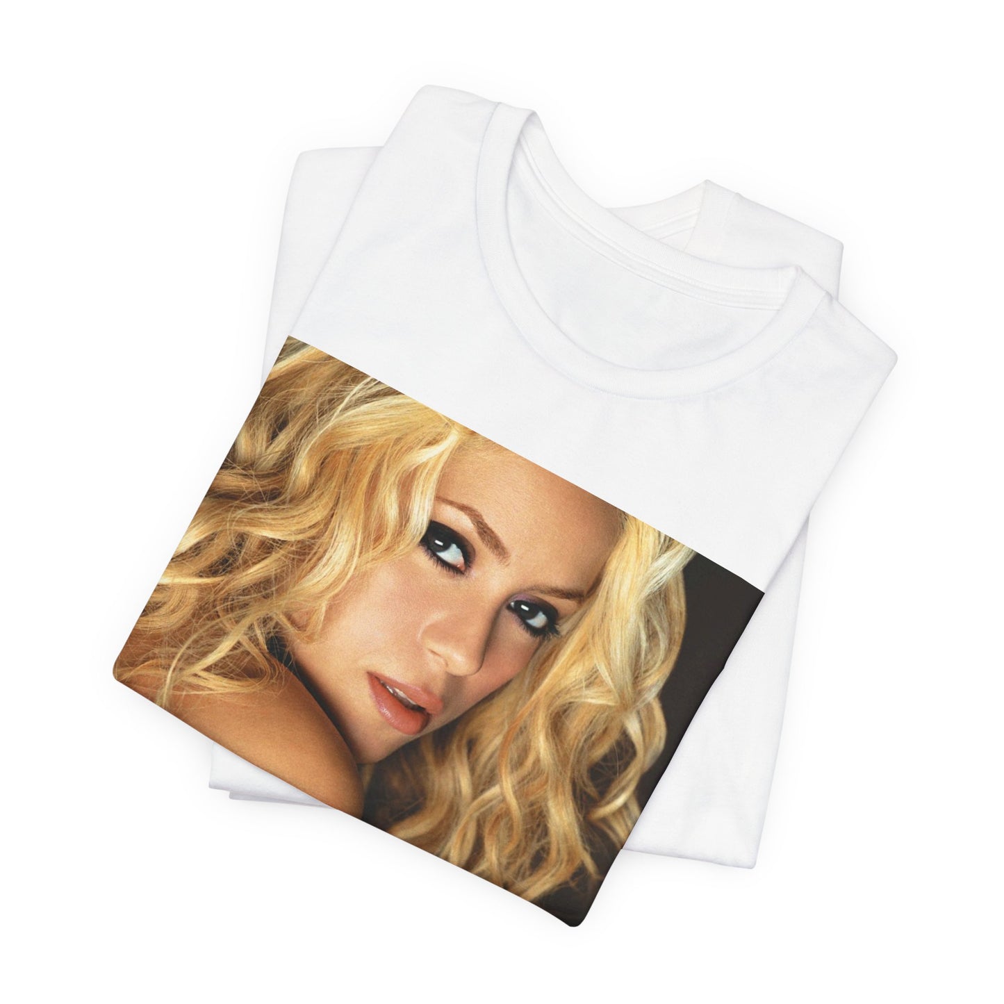 A black graphic t-shirt featuring a glamorous portrait graphic of Shakira.