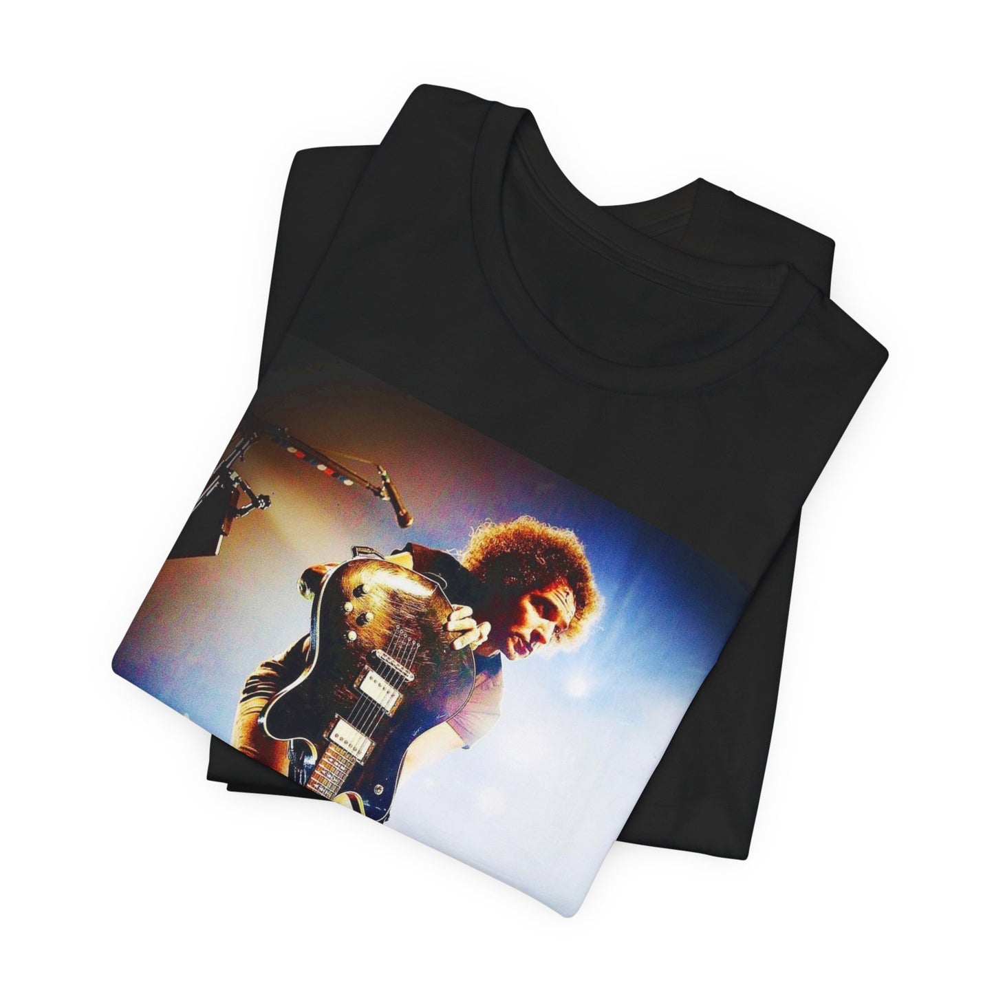 A black graphic t-shirt featuring a concert graphic for Alice In Chains' 2019 live show, with modern band imagery.