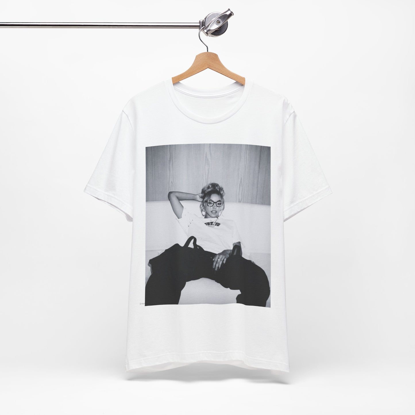 A black graphic t-shirt featuring a black and white portrait photo of Tinashe.