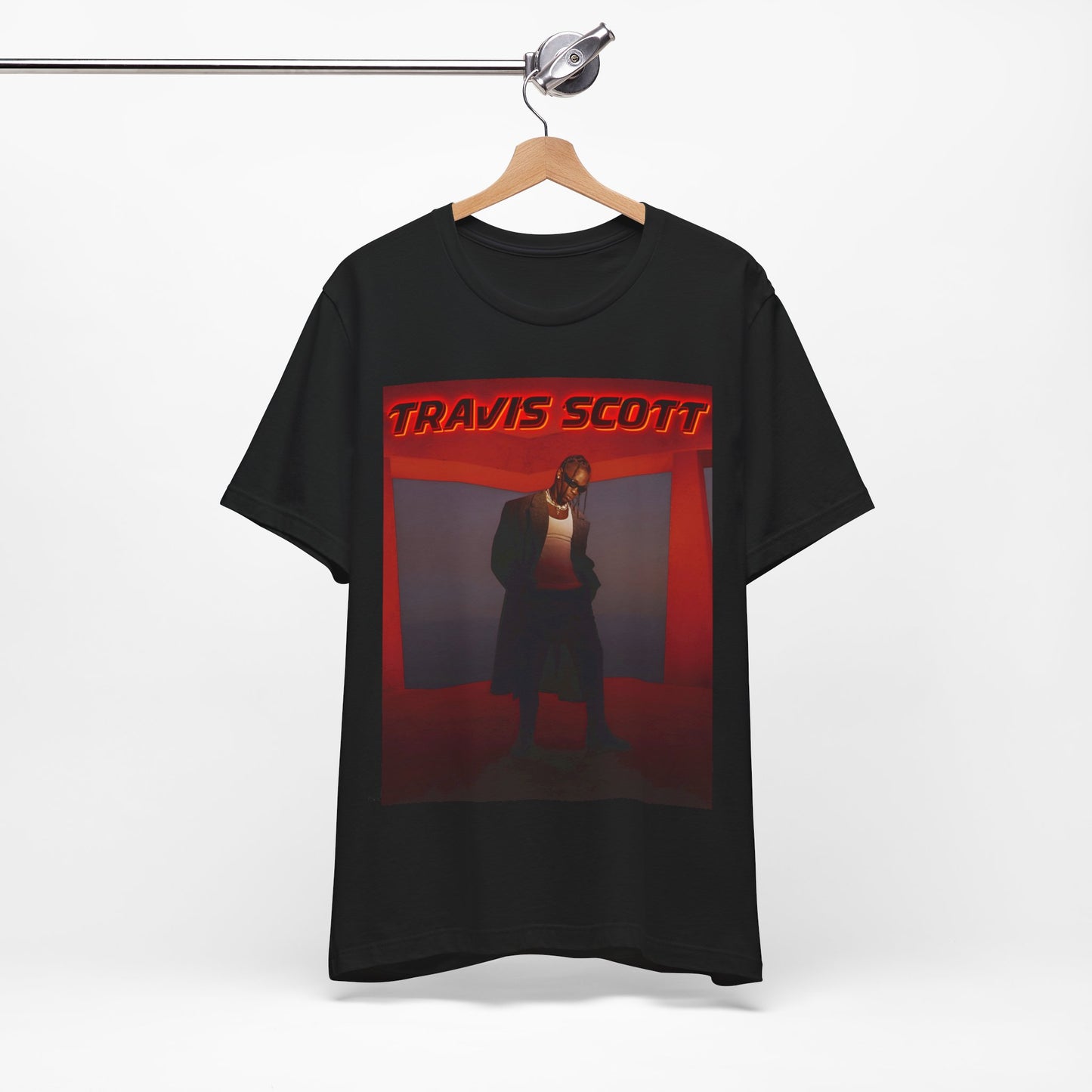 A black graphic t-shirt featuring a graphic of Travis Scott with a dreamy rap soundscape aesthetic.