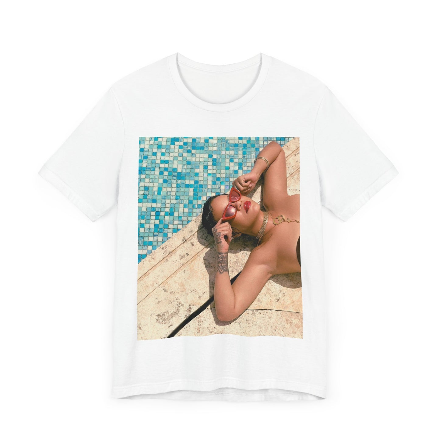 A black graphic t-shirt featuring a graphic of Rihanna in swimwear as a pop star queen.