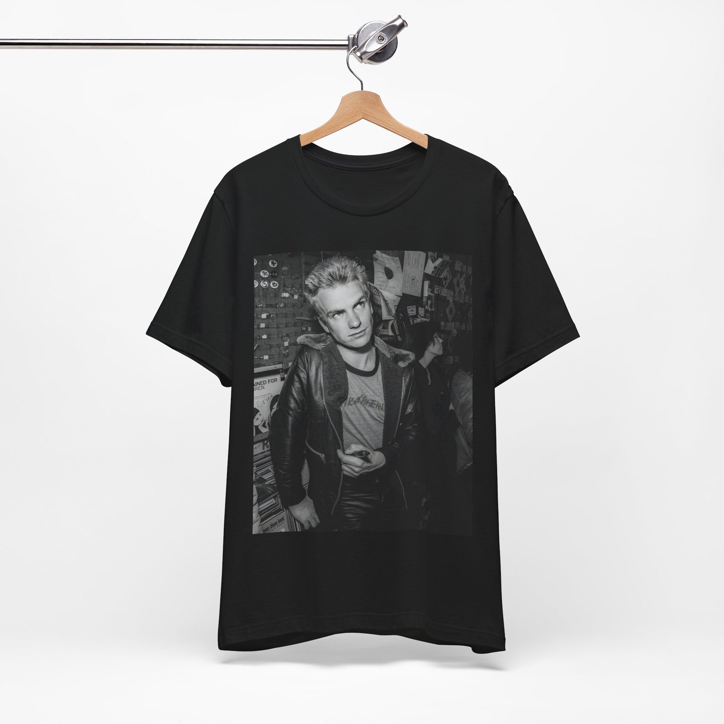 A black graphic t-shirt featuring a vintage black and white monochrome graphic or photo of Sting.