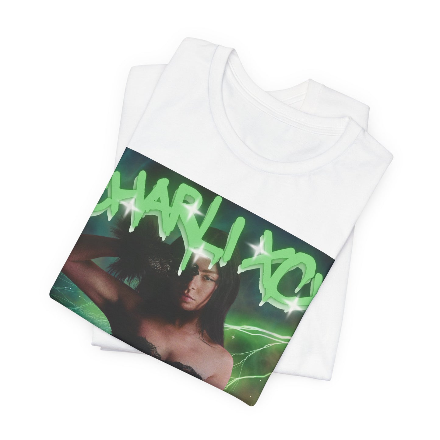 A black graphic t-shirt featuring a retro green neon graphic of Charli XCX's signature.