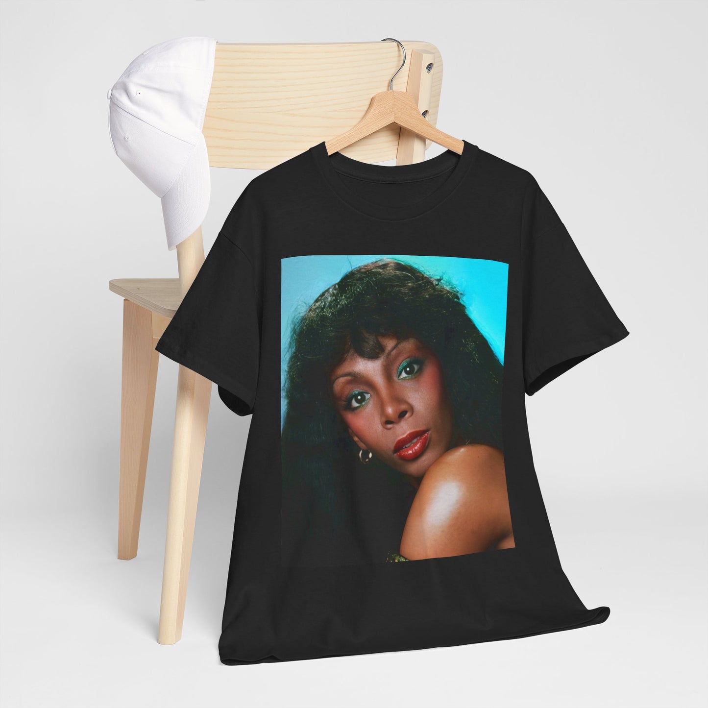A black graphic t-shirt featuring a graphic related to Donna Summer's 'Last Dance' song or era.