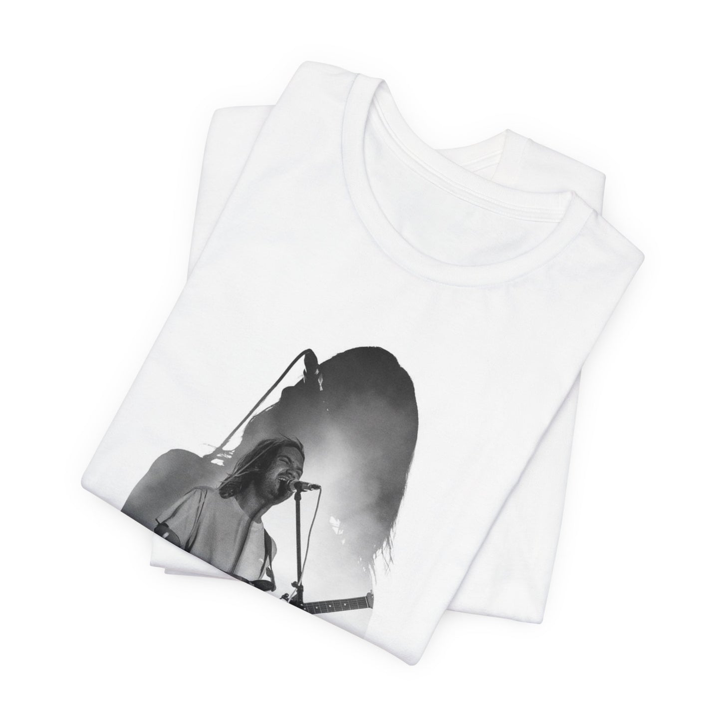 A black graphic t-shirt featuring a black and white, monochrome graphic or photo of Tame Impala.