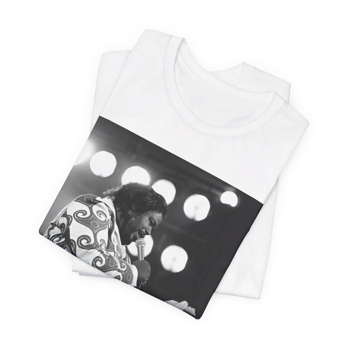 A black graphic t-shirt featuring a graphic or photo of Barry White performing live on stage in the 1970s.