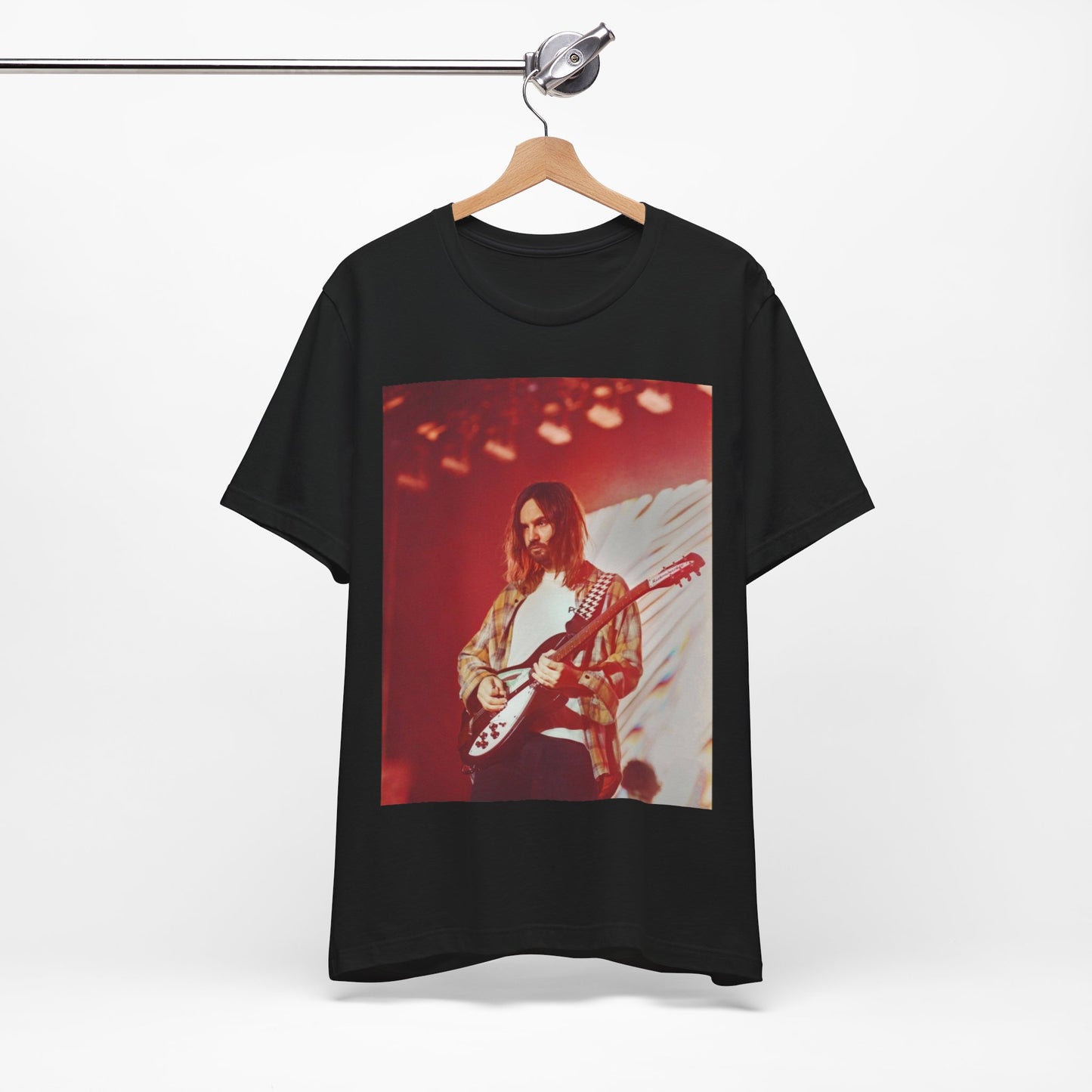 A black graphic t-shirt featuring a cool psychedelic journey graphic of Tame Impala.