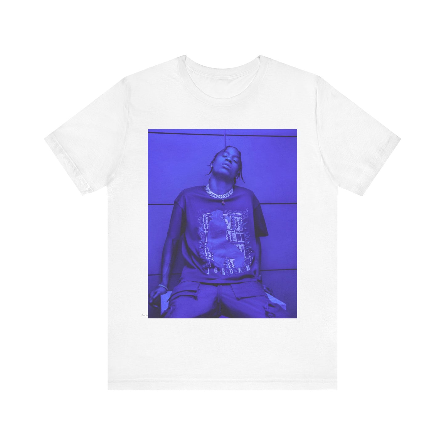 A black graphic t-shirt featuring a timeless trap star graphic of Travis Scott.