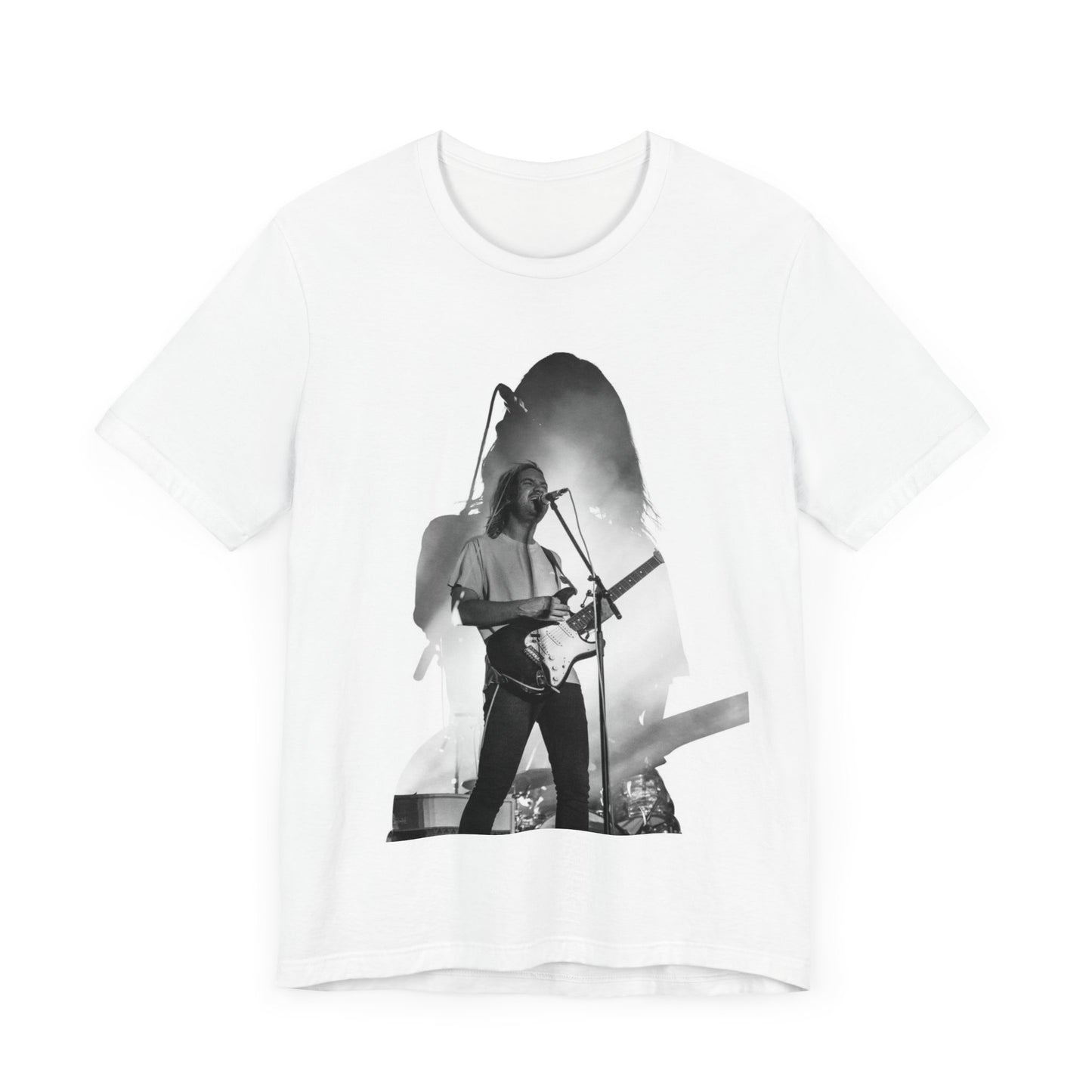 A black graphic t-shirt featuring a black and white, monochrome graphic or photo of Tame Impala.