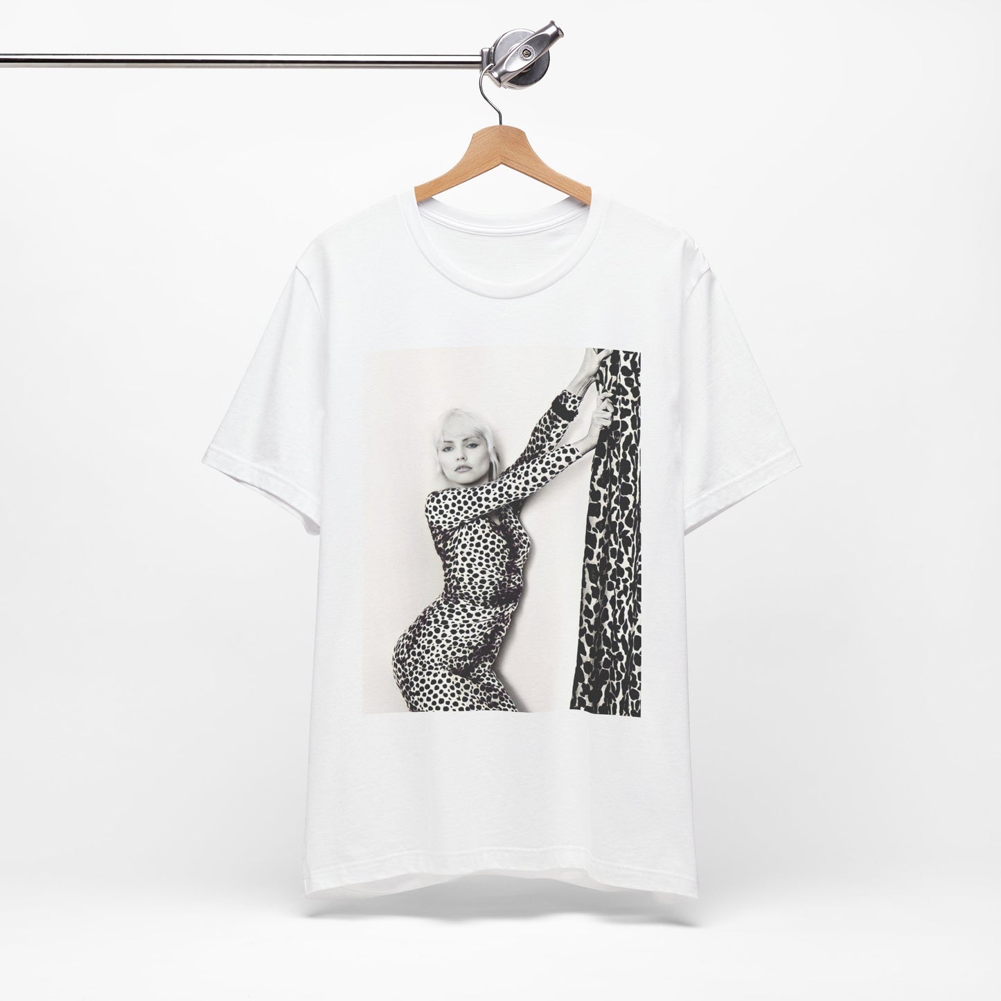 A black graphic t-shirt featuring a black and white, wild-style graphic of Blondie, emphasizing their untamed spirit.