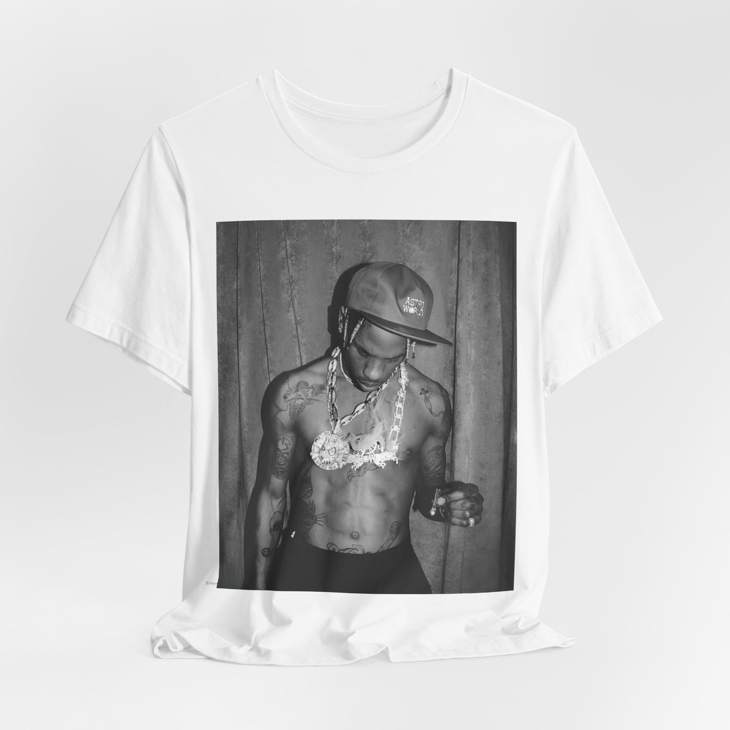 A black graphic t-shirt featuring a graphic of Travis Scott as the Houston rap king.
