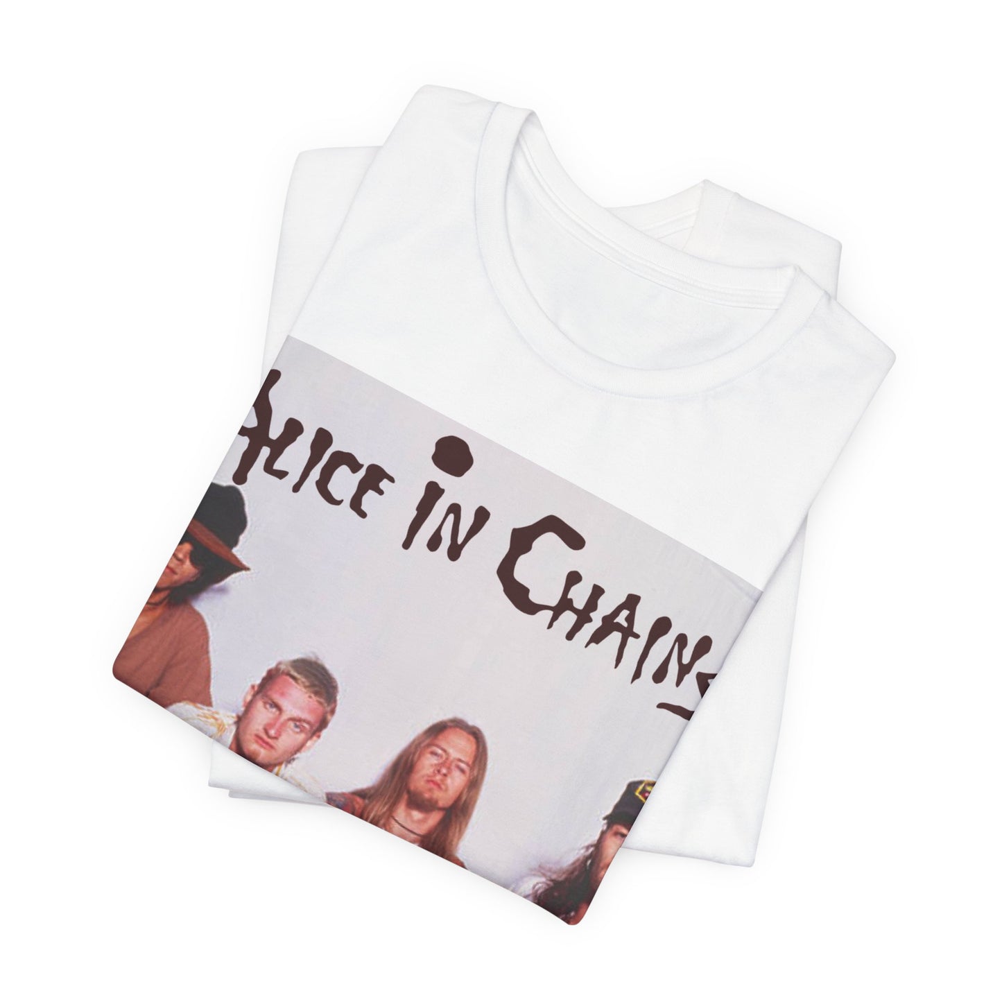 A black graphic t-shirt featuring a classic rock graphic of Alice In Chains from the 1990s, possibly with band members or stylized logo.