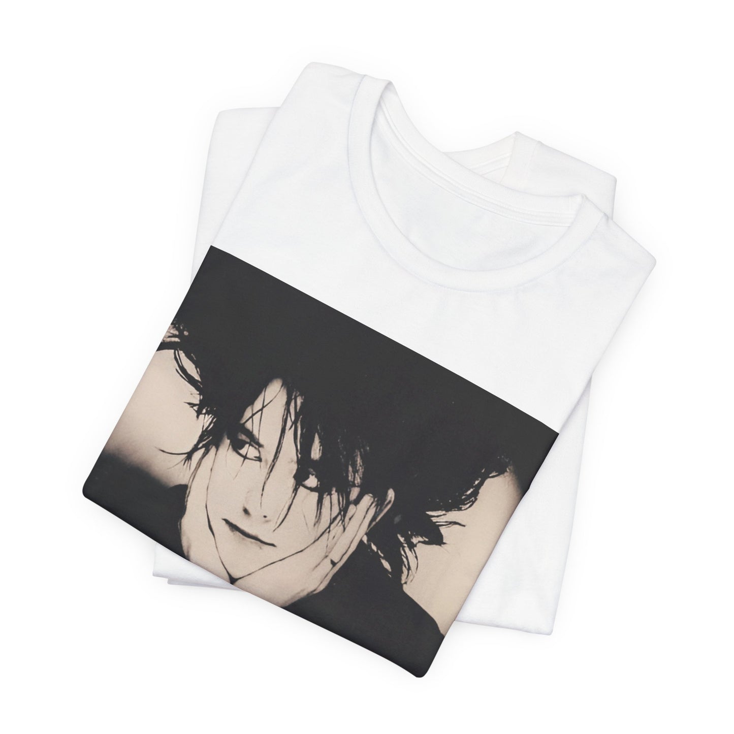 A black graphic t-shirt featuring a graphic of The Cure with cool new wave vibes.
