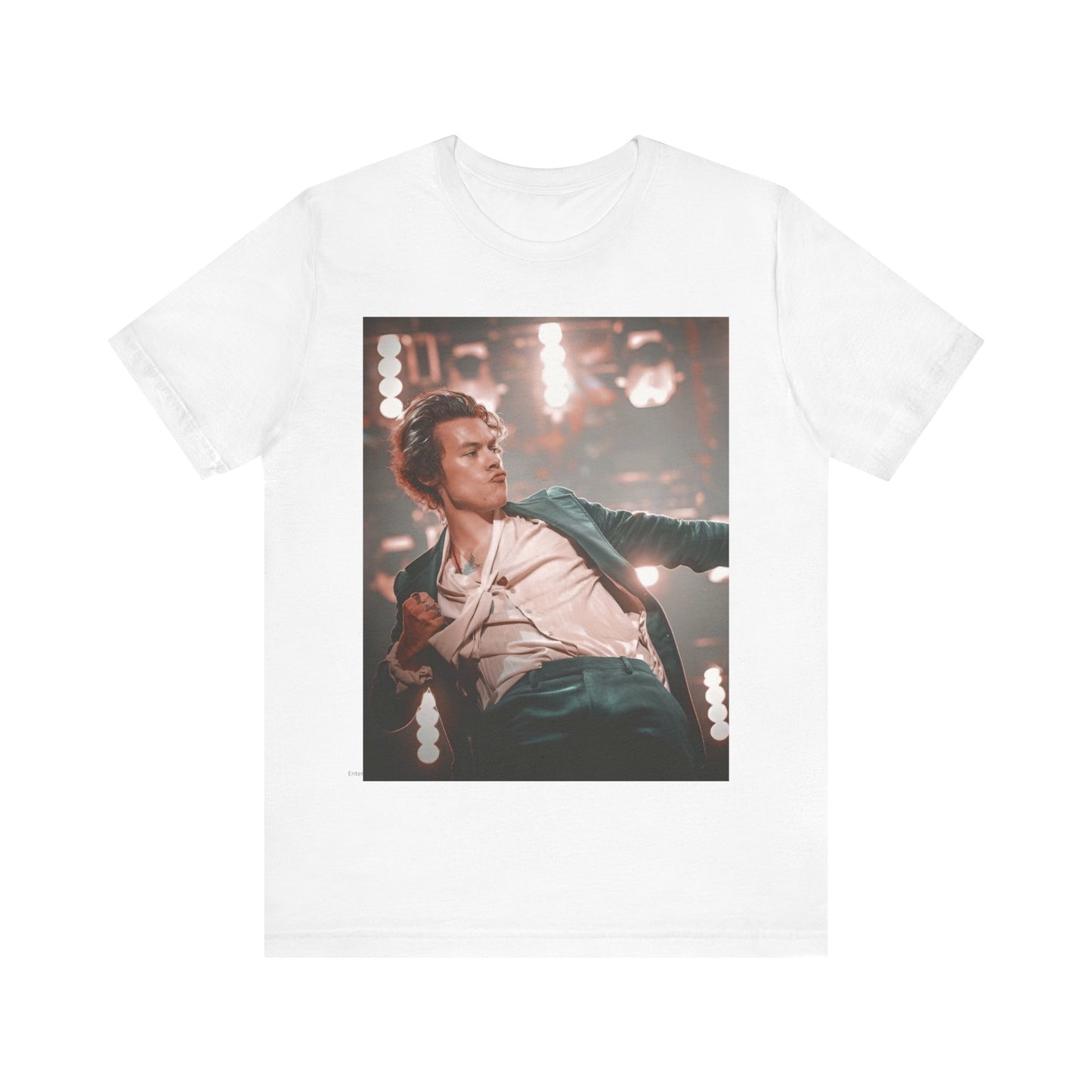 A black graphic t-shirt featuring a graphic or photo of Harry Styles performing live on concert tour.